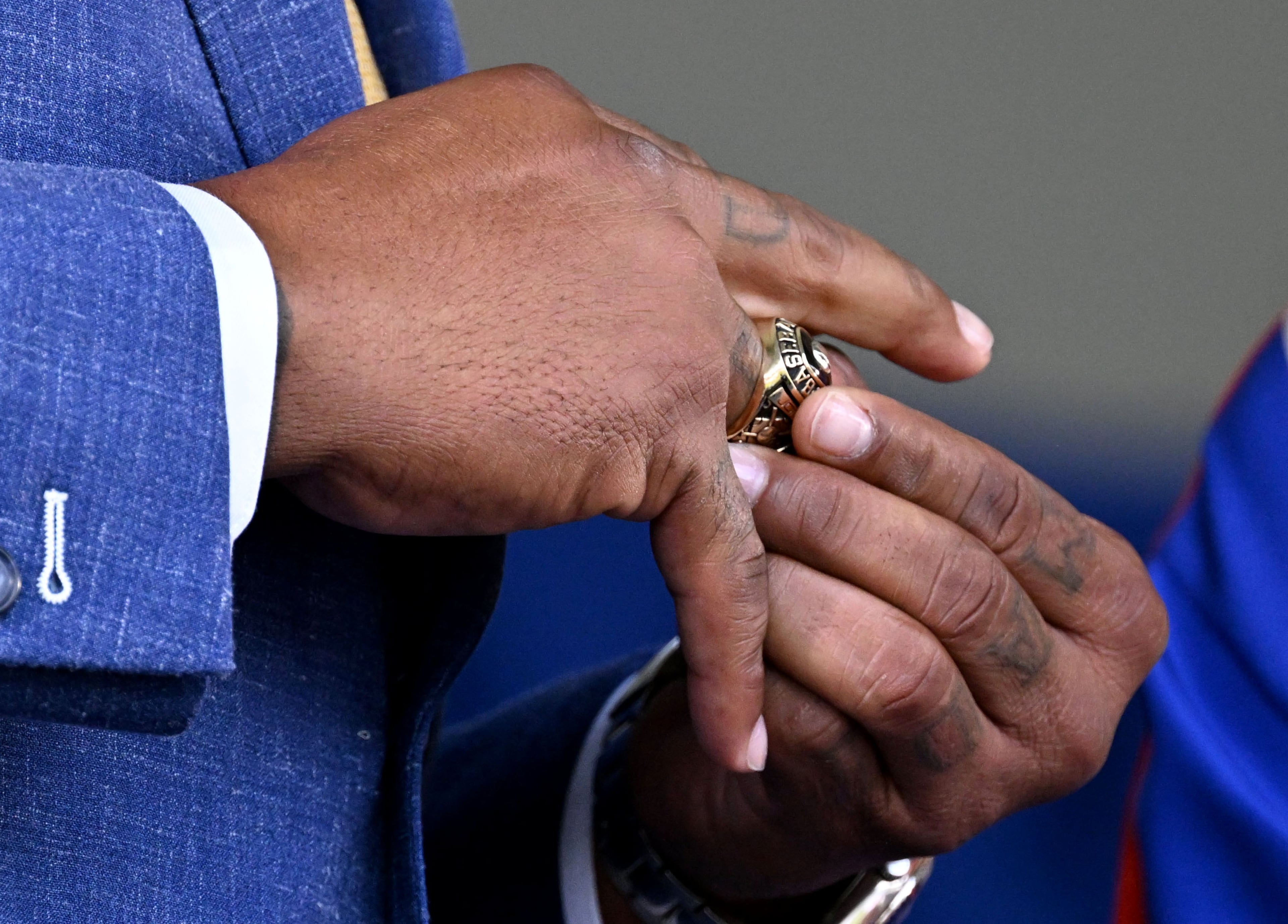 Andruw Jones receives a Hall of Fame ring from Jane Clark, chairman of the board of directors of the National Baseball Hall of Fame and Museum, during the 2026 National Baseball Hall of Fame Induction Ceremony at the Clark Sports Center on Sunday, July 26, 2026, in Cooperstown, N.Y. Braves centerfielder Andruw Jones is set for induction into the National Baseball Hall of Fame as part of the Class of 2026, alongside Carlos Beltrán and Jeff Kent. (Hyosub Shin/AJC)