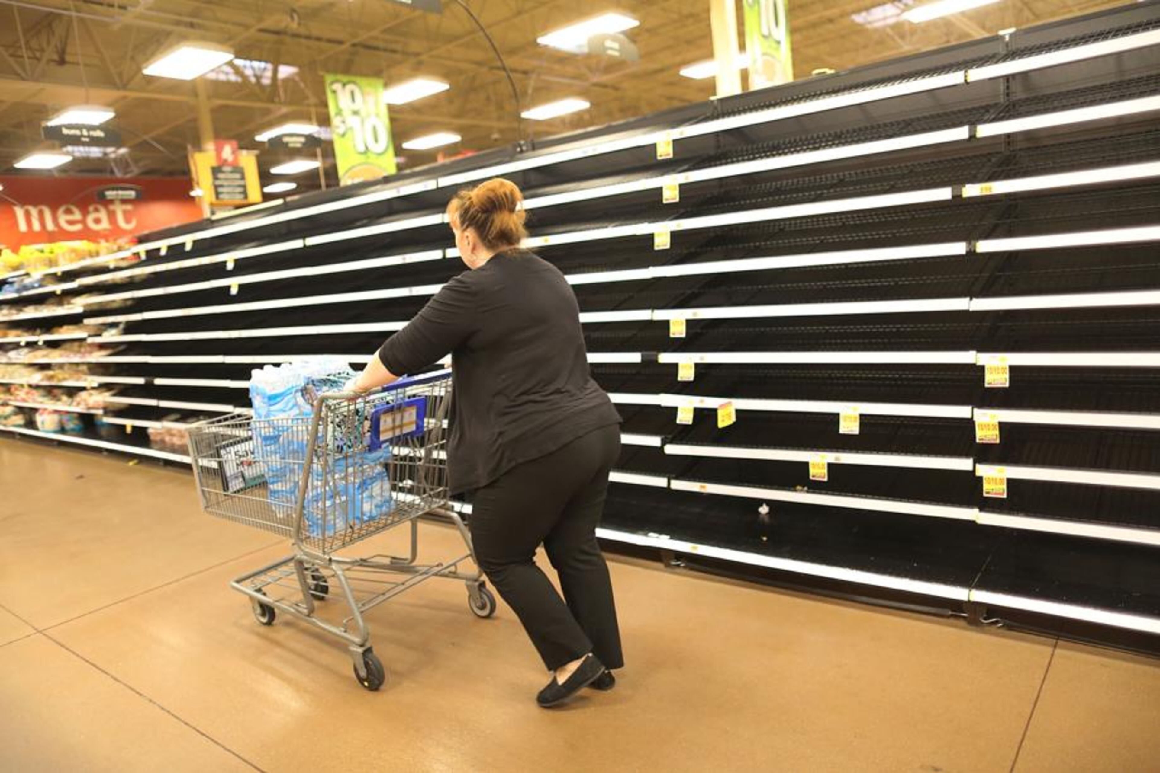 The bread section of a Kroger store is empty as people prepare for the possible arrival of Hurricane Harvey on August 24, 2017 in Houston, Texas. Hurricane Harvey has intensified into a hurricane and is aiming for the Texas coast with the potential for up to 3 feet of rain and 125 mph winds.