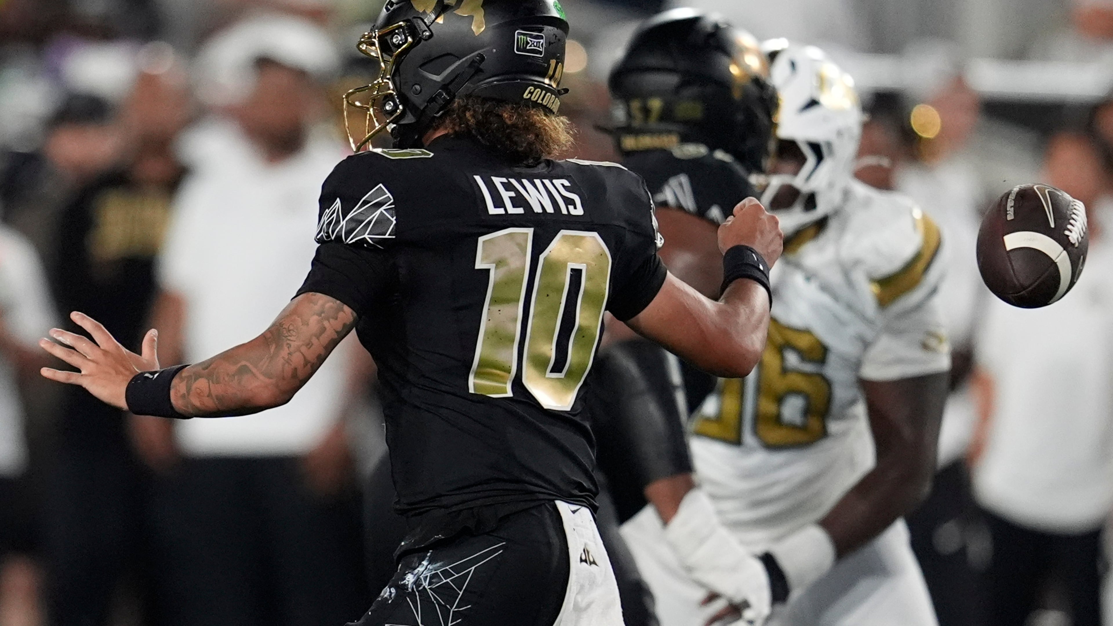 Colorado quarterback Julian Lewis (10) loses the ball whilst passing against Georgia Tech during the first half of an NCAA college football game, Thursday, Sept. 3, 2026, in Atlanta. (AP Photo/Mike Stewart)