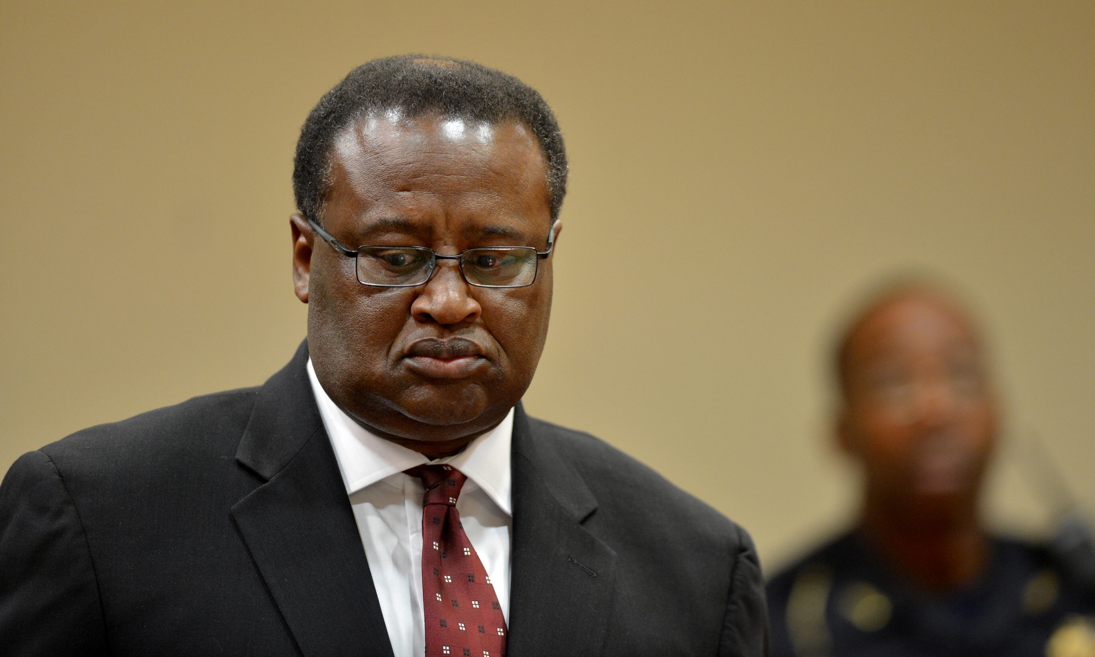 Former schools superintendent Crawford Lewis leaves to court to confer with his attorney after being sentenced. Judge Becker rejected prosecutors' recommendation that former superintendent Crawford Lewis be sentenced to 12 months on probation for misdemeanor obstruction, saying he deserved to be jailed. Defendants Tony Pope, Pat Reid and Crawford Lewis were sentenced in the Dekalb schools corruption case before Superior Court Judge Cynthia Becker Monday, December 9, 2013. Pope, the former chief operating officer for DeKalb County schools was sentenced to 15 years in prison and her former husband, Tony Pope, was sentenced to eight years in prison for manipulating construction contracts that paid the husband $1.4 million for work he should not have received. was sentenced. Judge Becker rejected prosecutors' recommendation that former superintendent Crawford Lewis be sentenced to 12 months on probation for misdemeanor obstruction, saying he deserved to be jailed. KENT D. JOHNSON / KDJOHNSON@AJC.COM