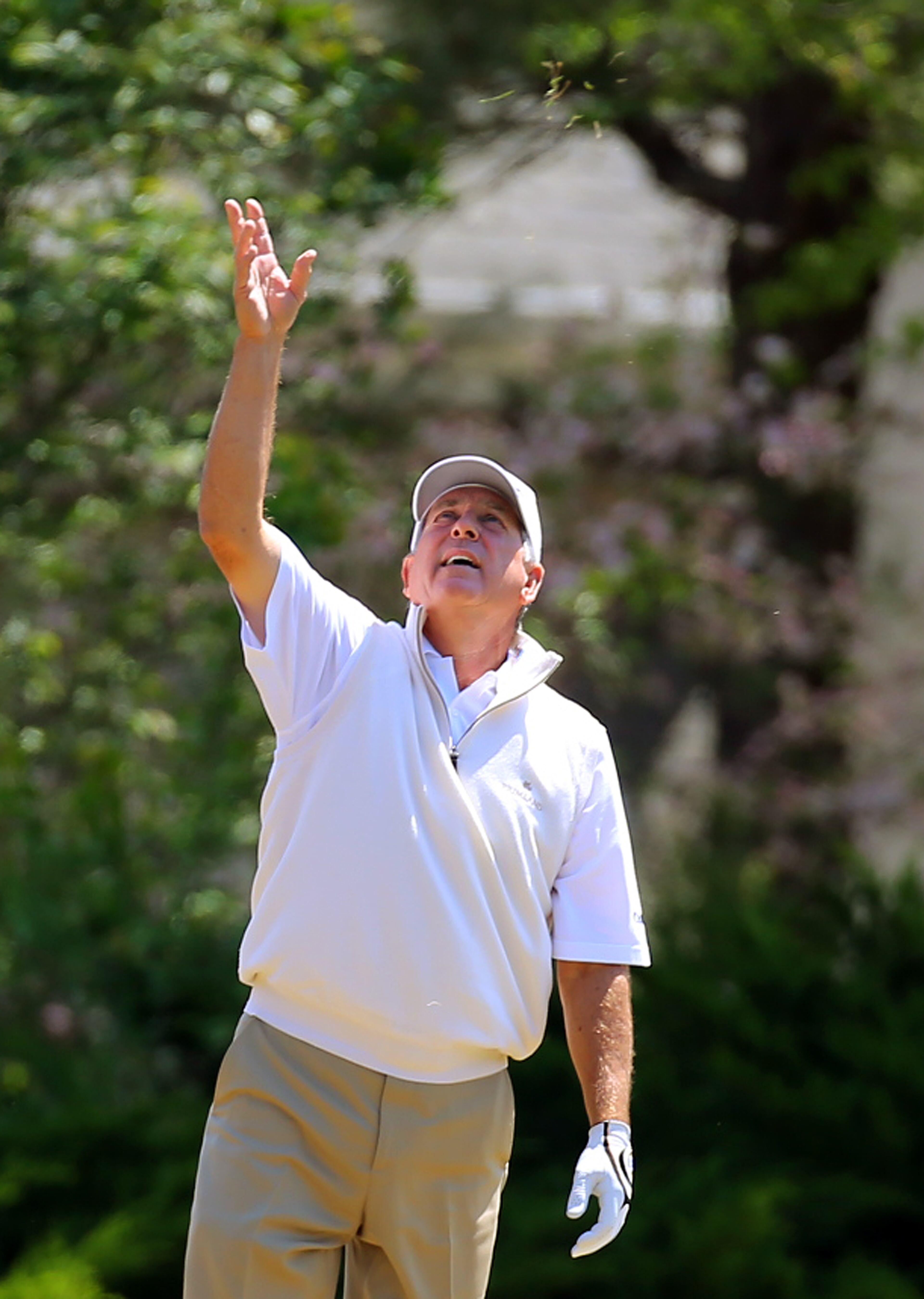 Jay Haas of Greenville, S.C., checks the wind before hitting his fairway shot to the No. 1 hole during the final round of the Greater Gwinnett Championship at TPC Sugarloaf on Sunday, April 20, 2014, in Duluth. CURTIS COMPTON / CCOMPTON@AJC.COM