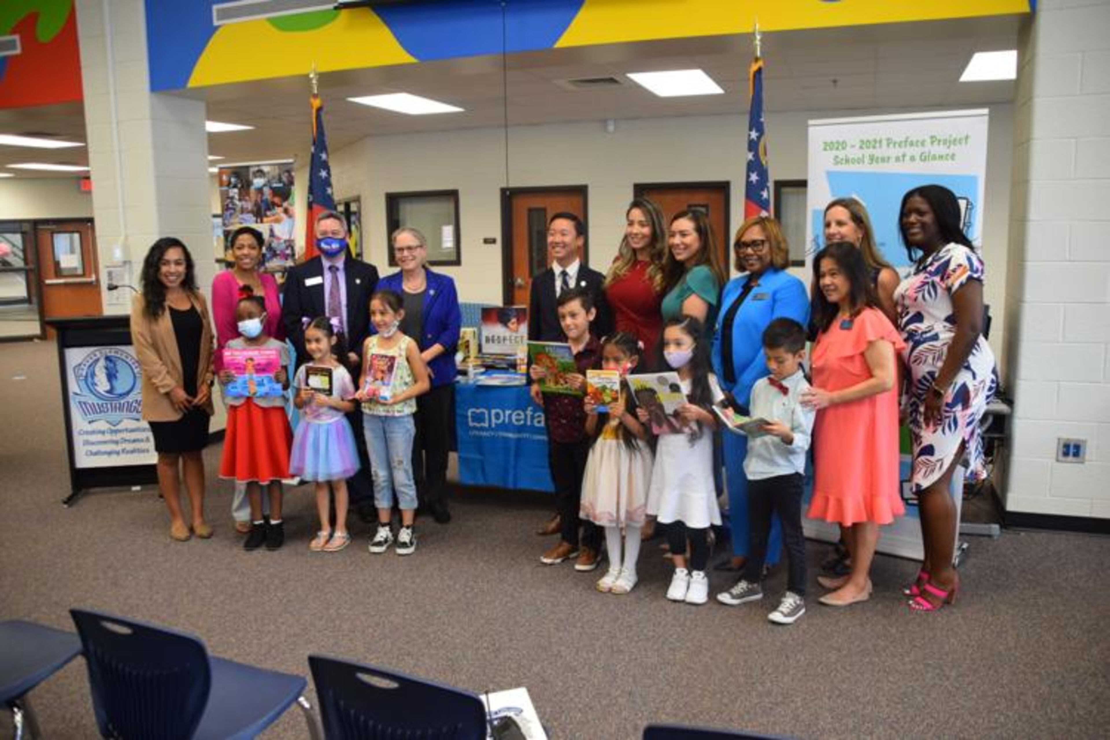 Graves Elementary School Principal Monica Ball addressed attendees at a ceremony where literacy education nonprofit Preface donated more than 200 multilingual books to the school's library. (Courtesy of Curt Yeomans)