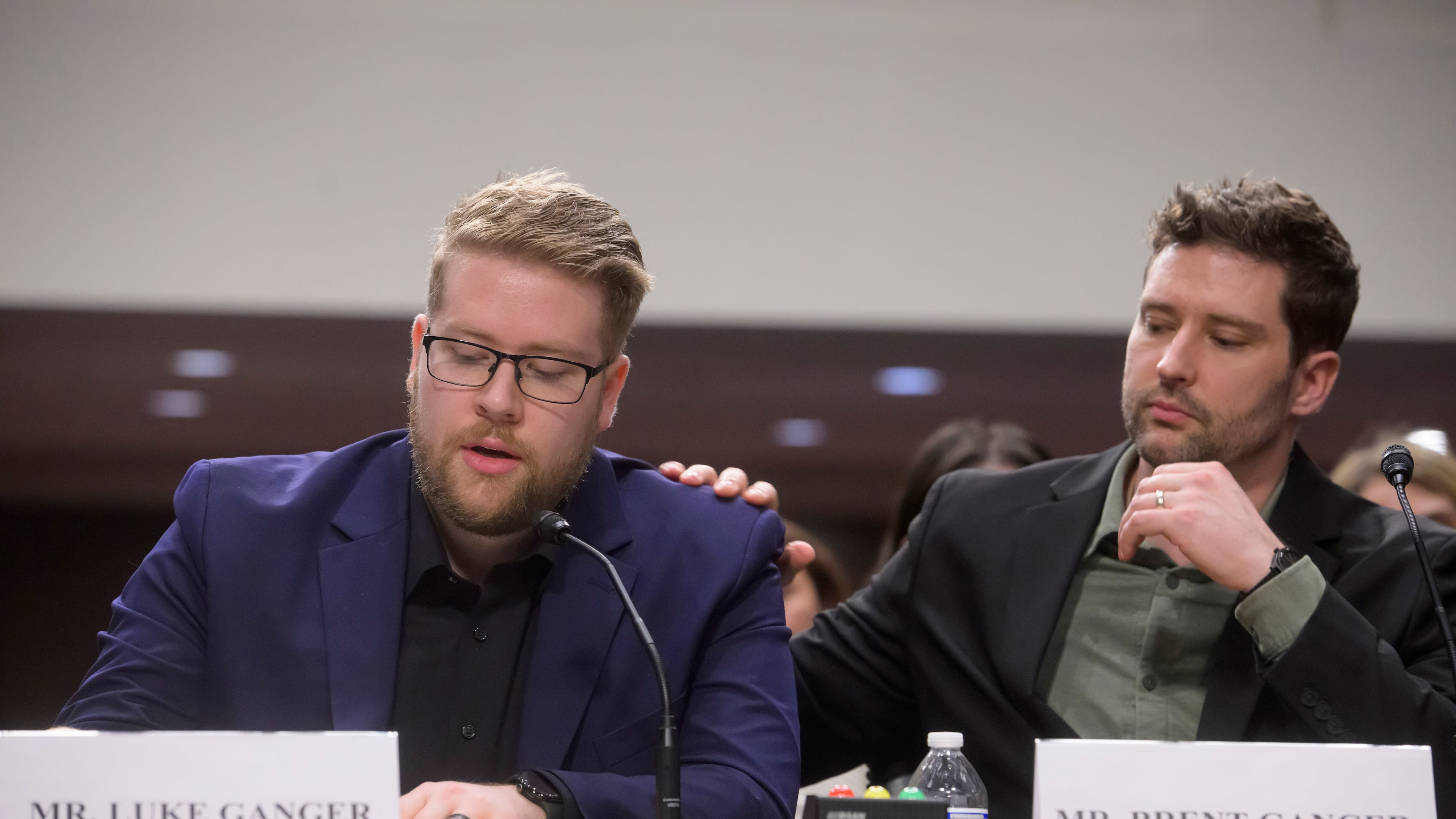 Luke Ganger, left, and Brent Ganger, right, brothers of Renee Good, appear during a Bicameral Public Forum on the Disproportionate Use of Force by DHS Agents, on Capitol Hill, Tuesday, Feb. 3, 2026, in Washington. (AP Photo/Rod Lamkey, Jr.)