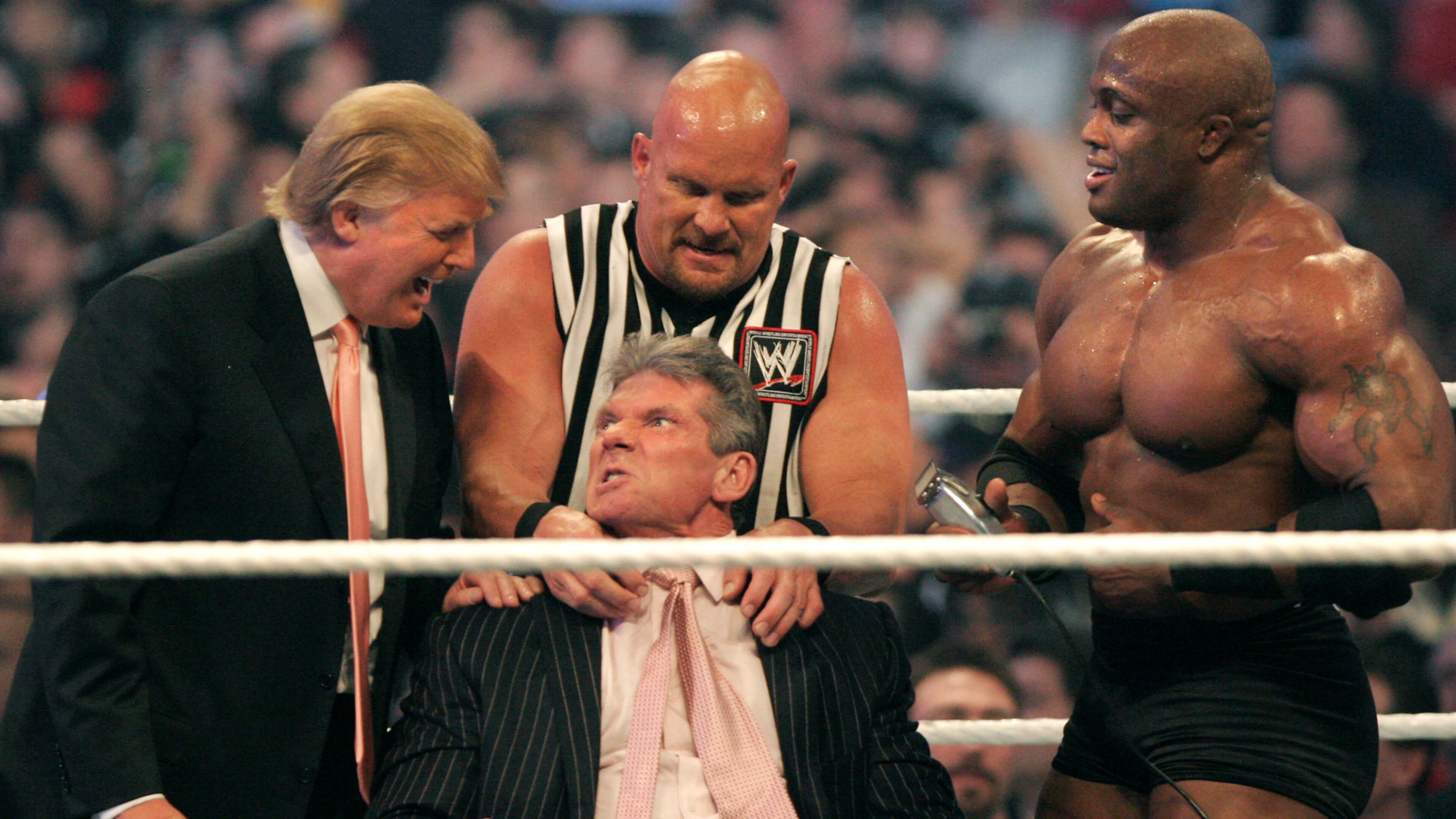 DETROIT - APRIL 1: WWE chairman Vince McMahon (C) has his head shaved by Donald Trump (L) and Bobby Lashley (R) while being held down by ''Stone Cold'' Steve Austin after losing a bet in the Battle of the Billionaires at the 2007 World Wrestling Entertainment's Wrestlemania at Ford Field on April 1, 2007 in Detroit, Michigan. Umaga was representing McMahon in the match when he lost to Bobby Lashley who was representing Trump. (Photo by Bill Pugliano/Getty Images)