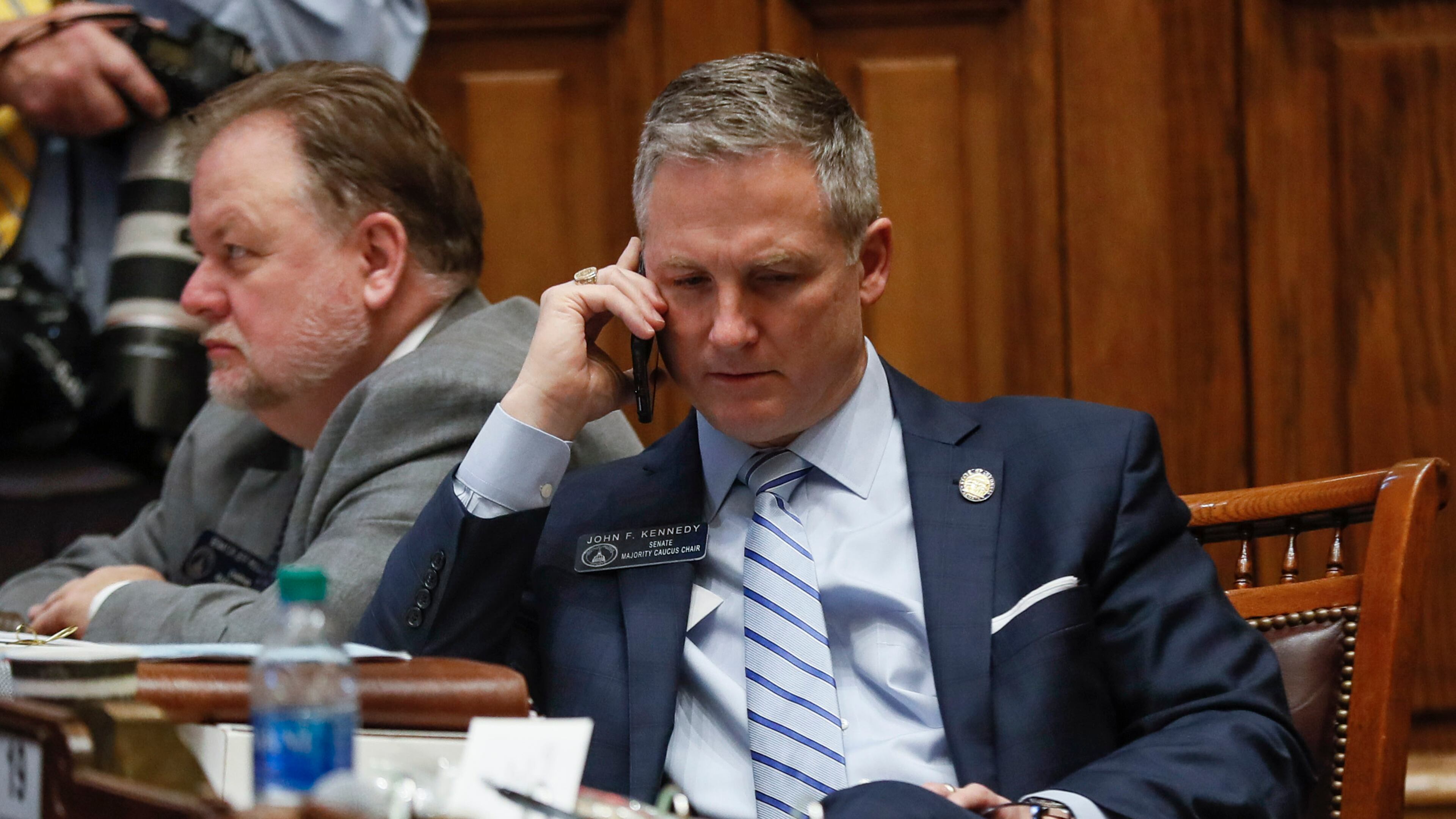 Georgia Sen. John F. Kennedy, R - Macon, talks on his phone on the Senate floor in February 2020. Bob Andres / bandres@ajc.com