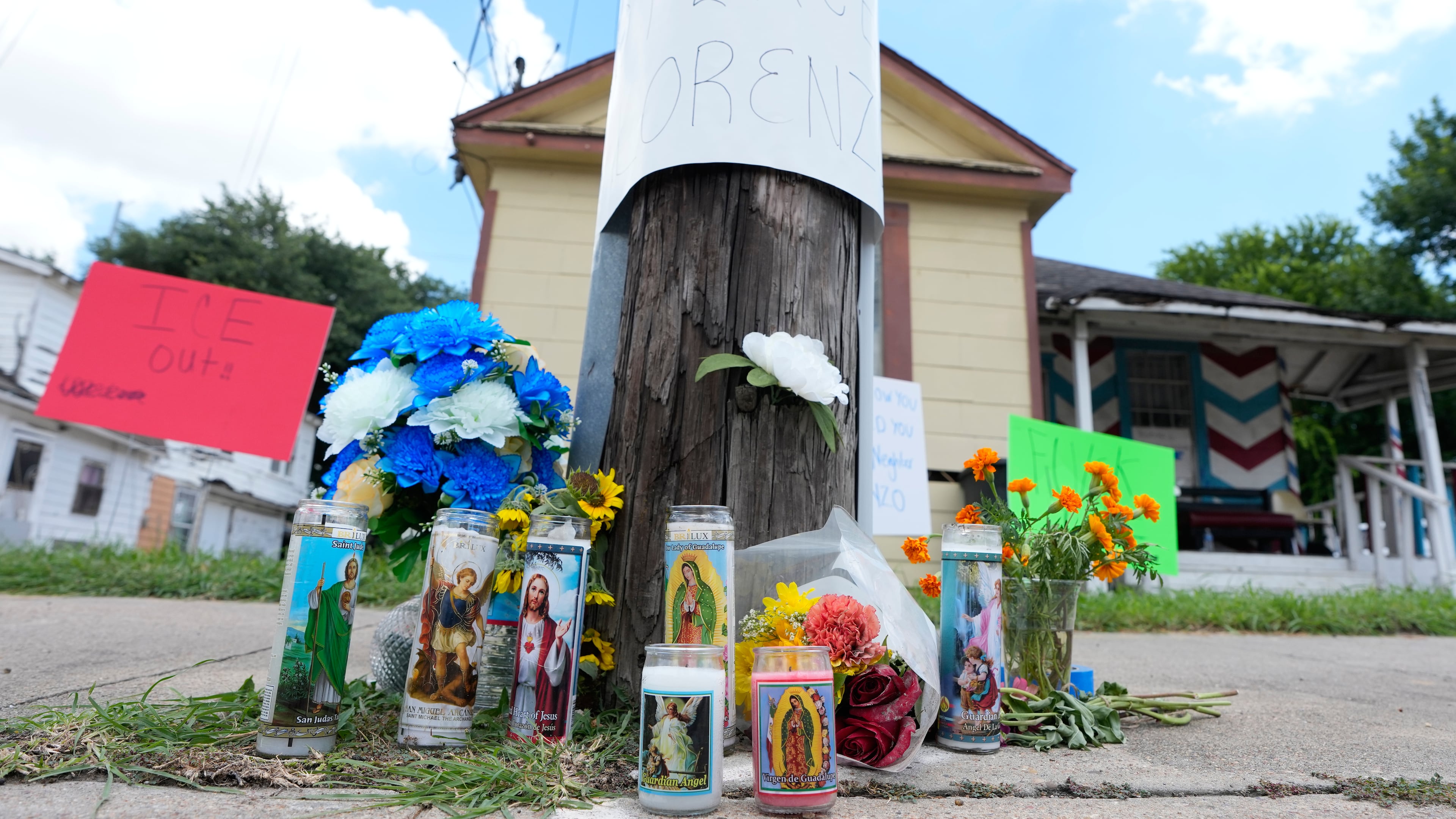 A makeshift memorial for Lorenzo Salgado Araujo, who was shot and killed by an ICE officer Tuesday, is shown Wednesday, July 8, 2026, in Houston. (AP Photo/David J. Phillip)