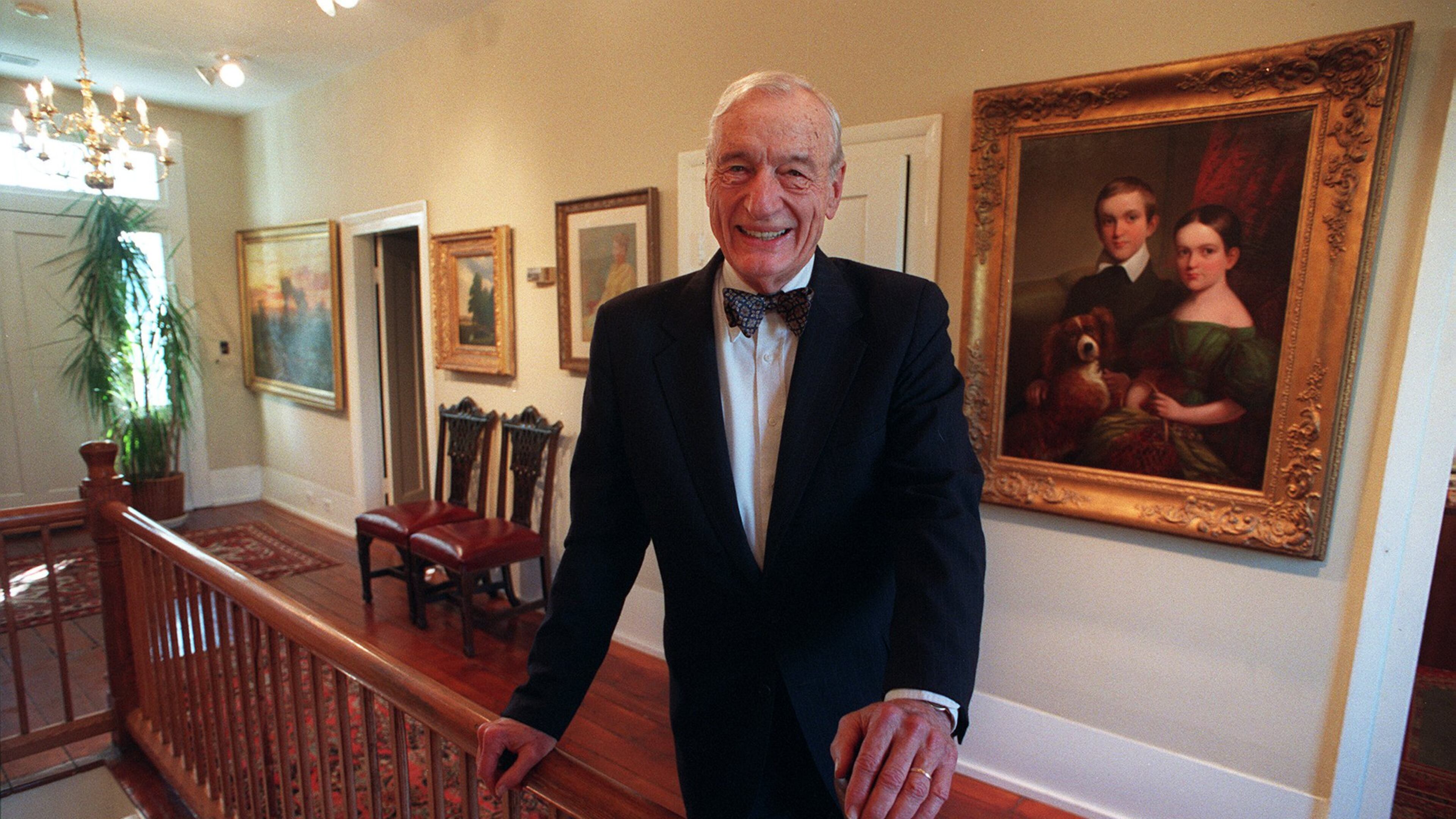 Cobb attorney Fred Bentley with some of the art he collected over the years. Bentley influenced the county, having a hand in founding or serving in institutions from government to local nonprofits. PHOTO BY ANDY SHARP/STAFF.