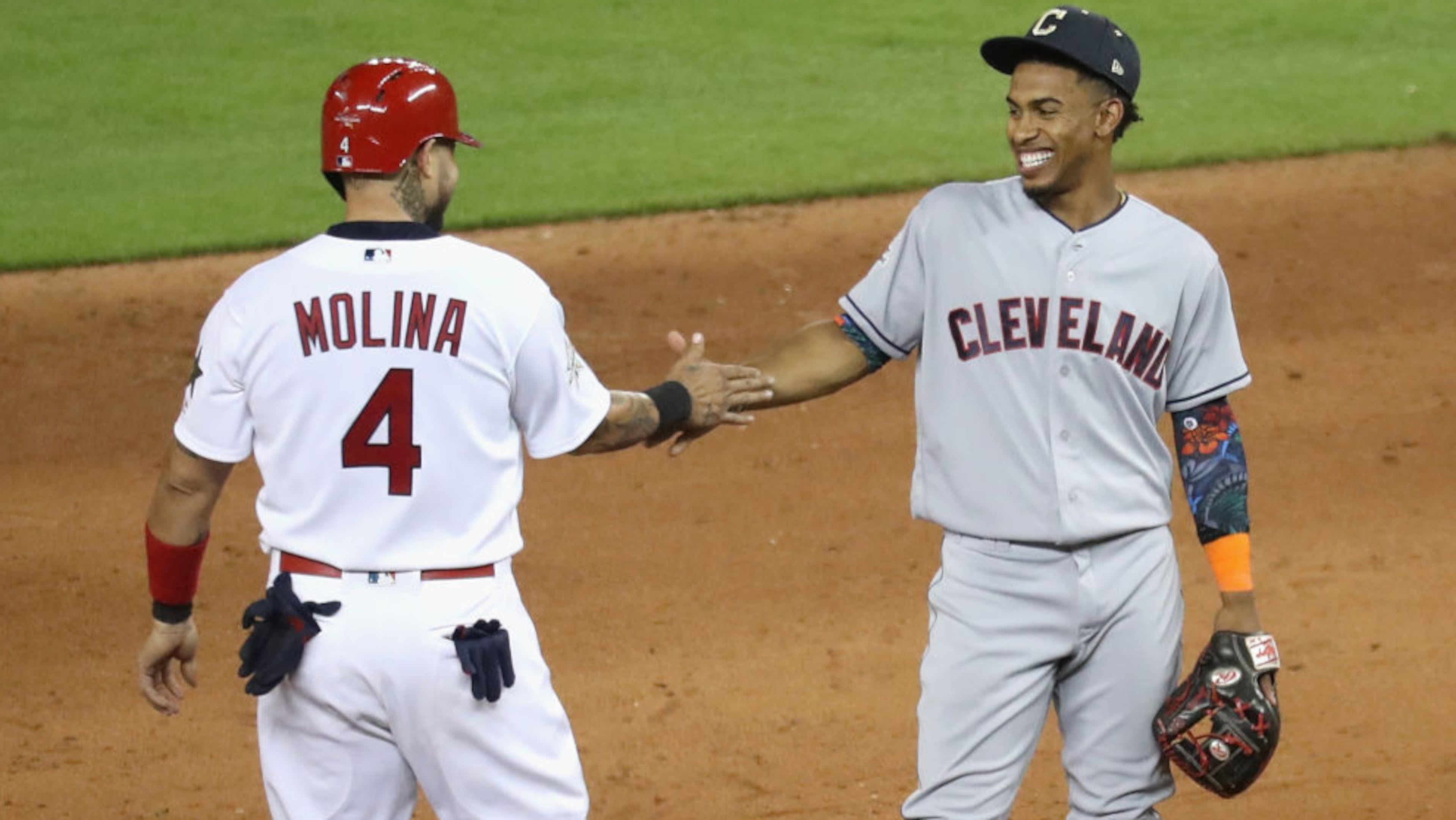 Yadier Molina #4 of the St. Louis Cardinals and the National League reacts with Francisco Lindor #12 of the Cleveland Indians and the American League during the 88th MLB All-Star Game at Marlins Park on July 11, 2017 in Miami, Florida. (Photo by Rob Carr/Getty Images)