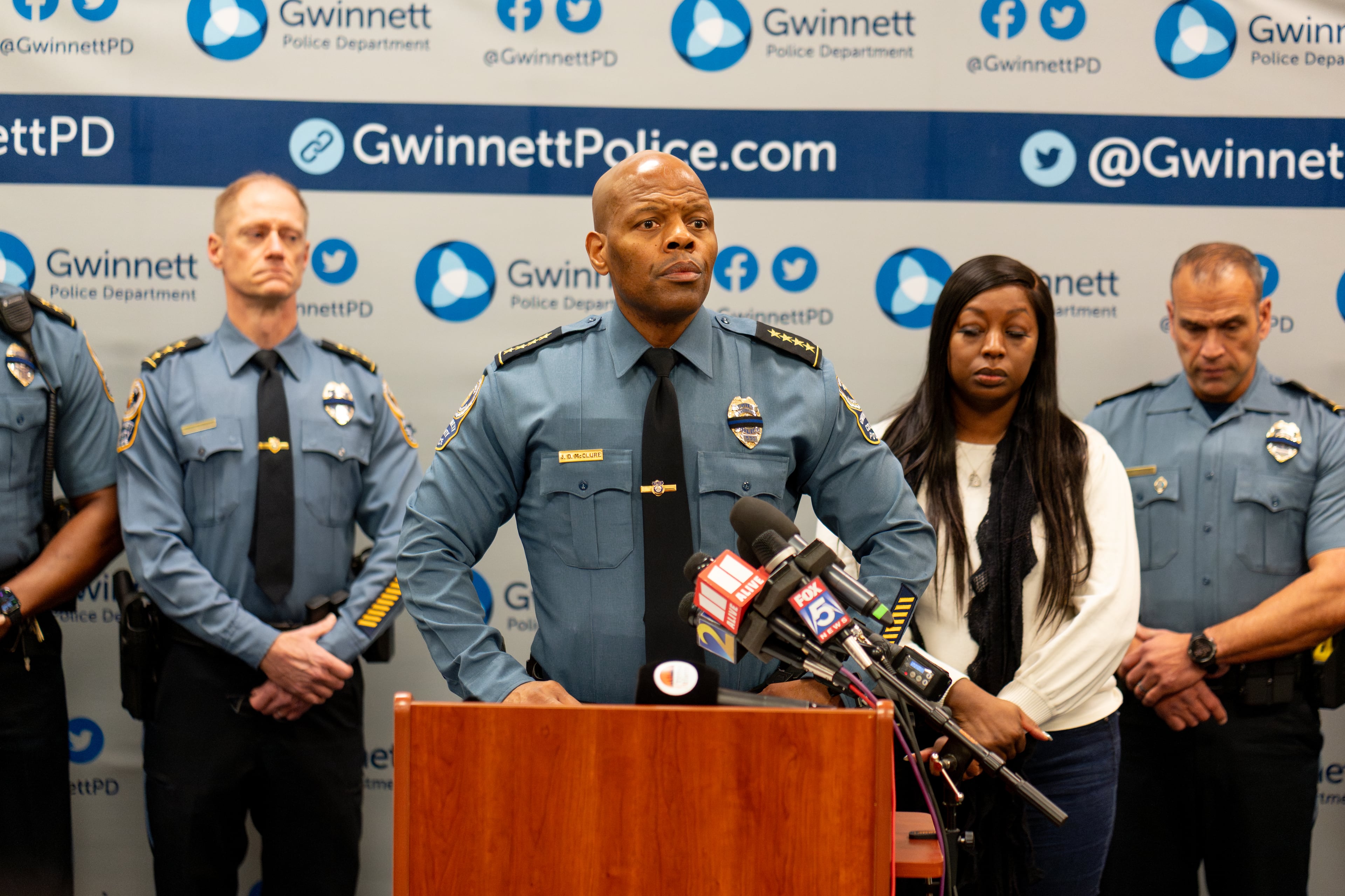 Gwinnett County Police Chief J.D McClure gives a statement to the media regarding the death of an officer at a Holiday Inn Express on East Park Place Boulevard near Stone Mountain on Sunday. (Ben Hendren for the AJC)
