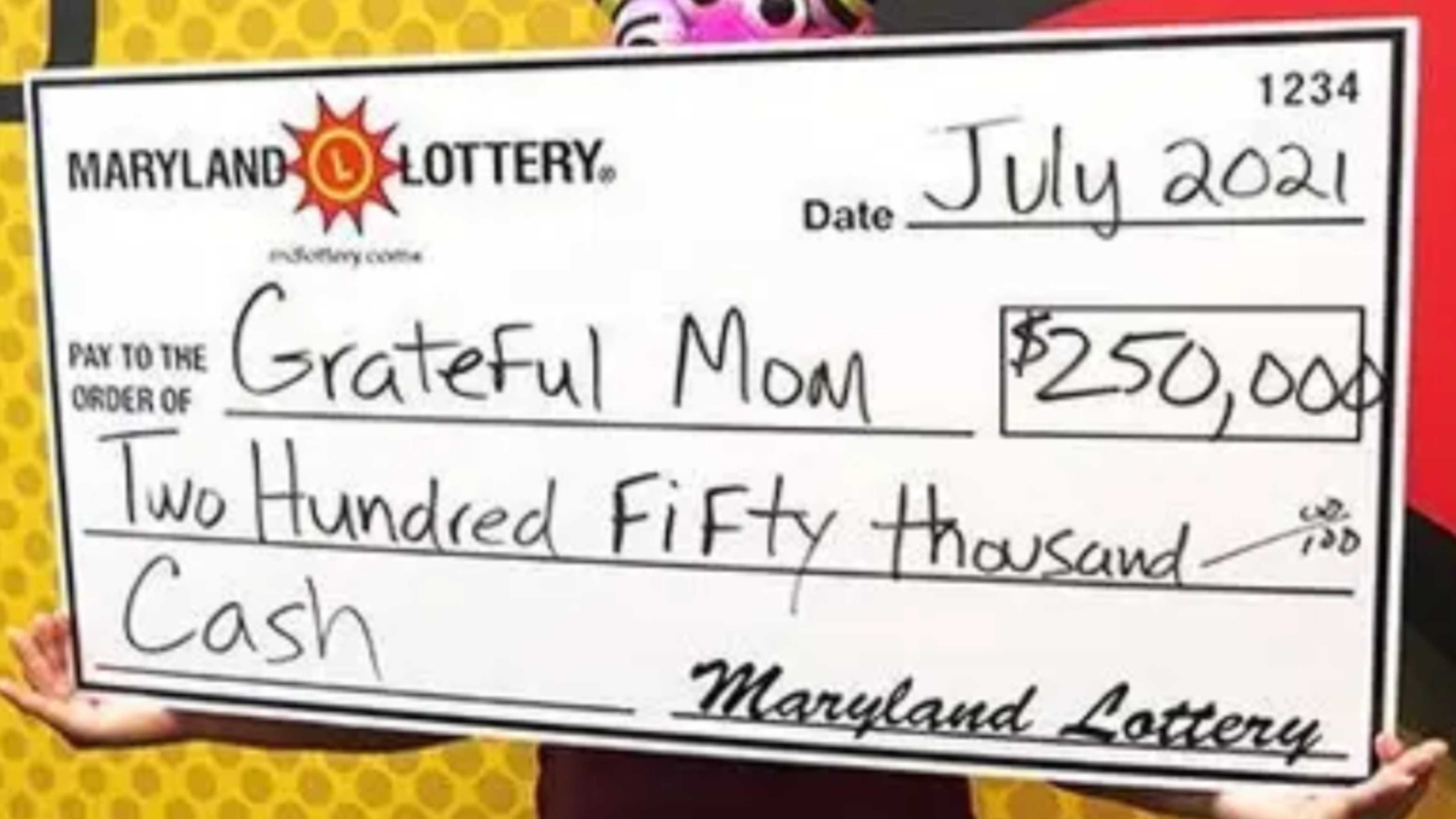 An Uber Eats delivery driver from Maryland was waiting for her next job when she received an unexpected bonus: a $250,000 prize on a $10 scratch-off lottery ticket. (Image: The Maryland Lottery)