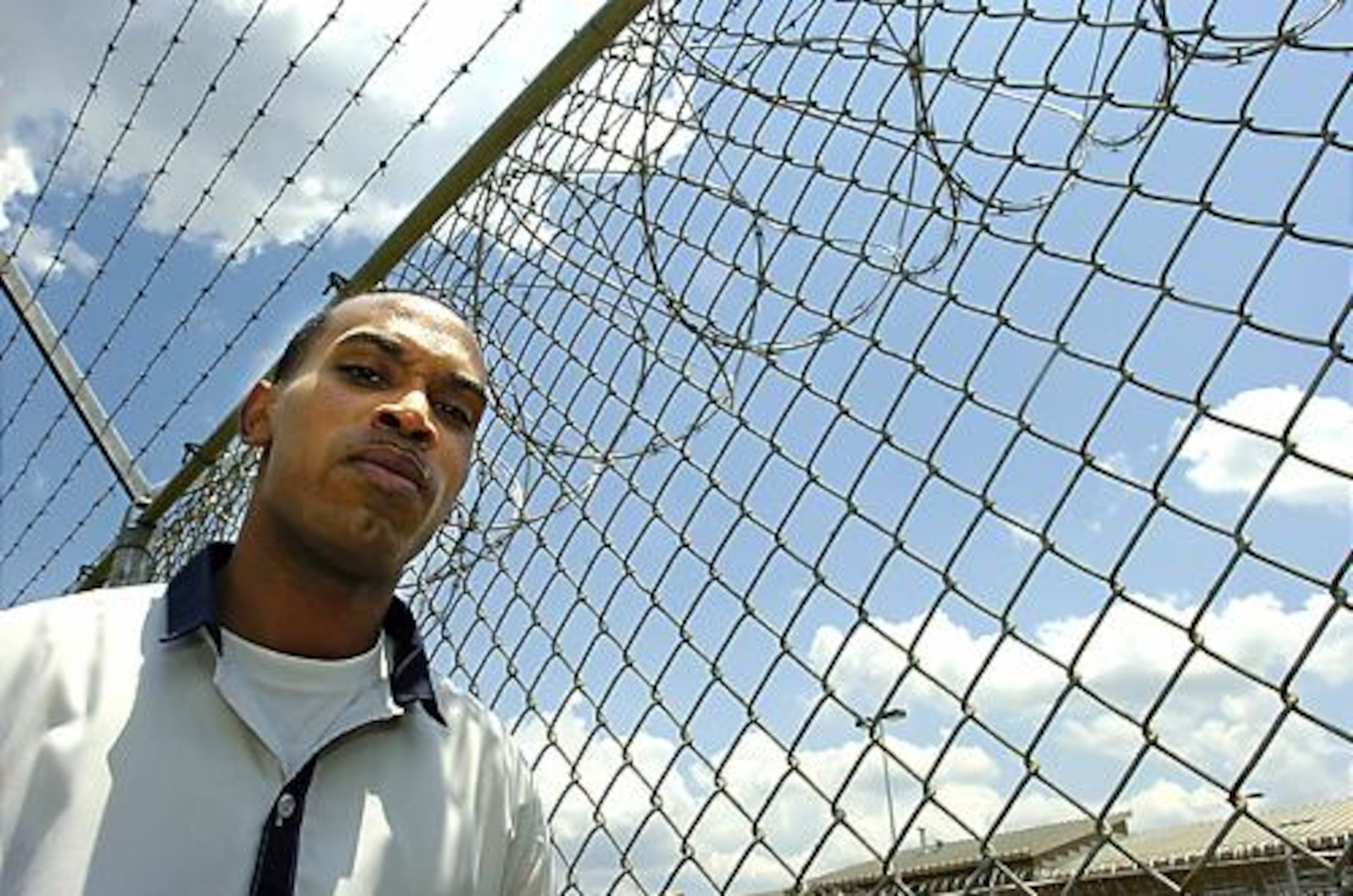 Genarlow Wilson poses in the yard of the Burrus Correctional Training Center.