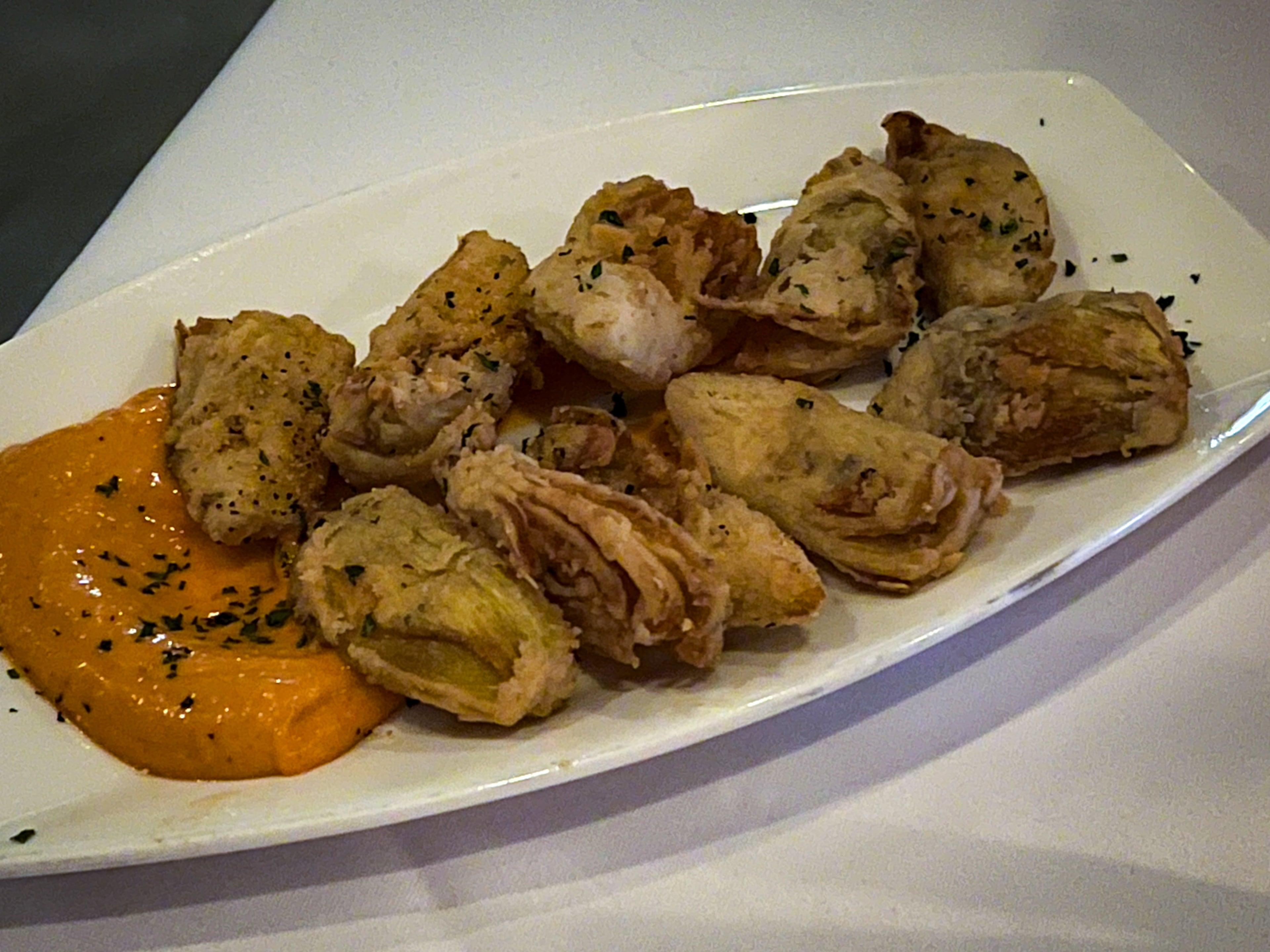 The overly salty fried artichokes were one of the more disappointing dishes at Nowak's Sandy Springs. Henri Hollis/henri.hollis@ajc.com