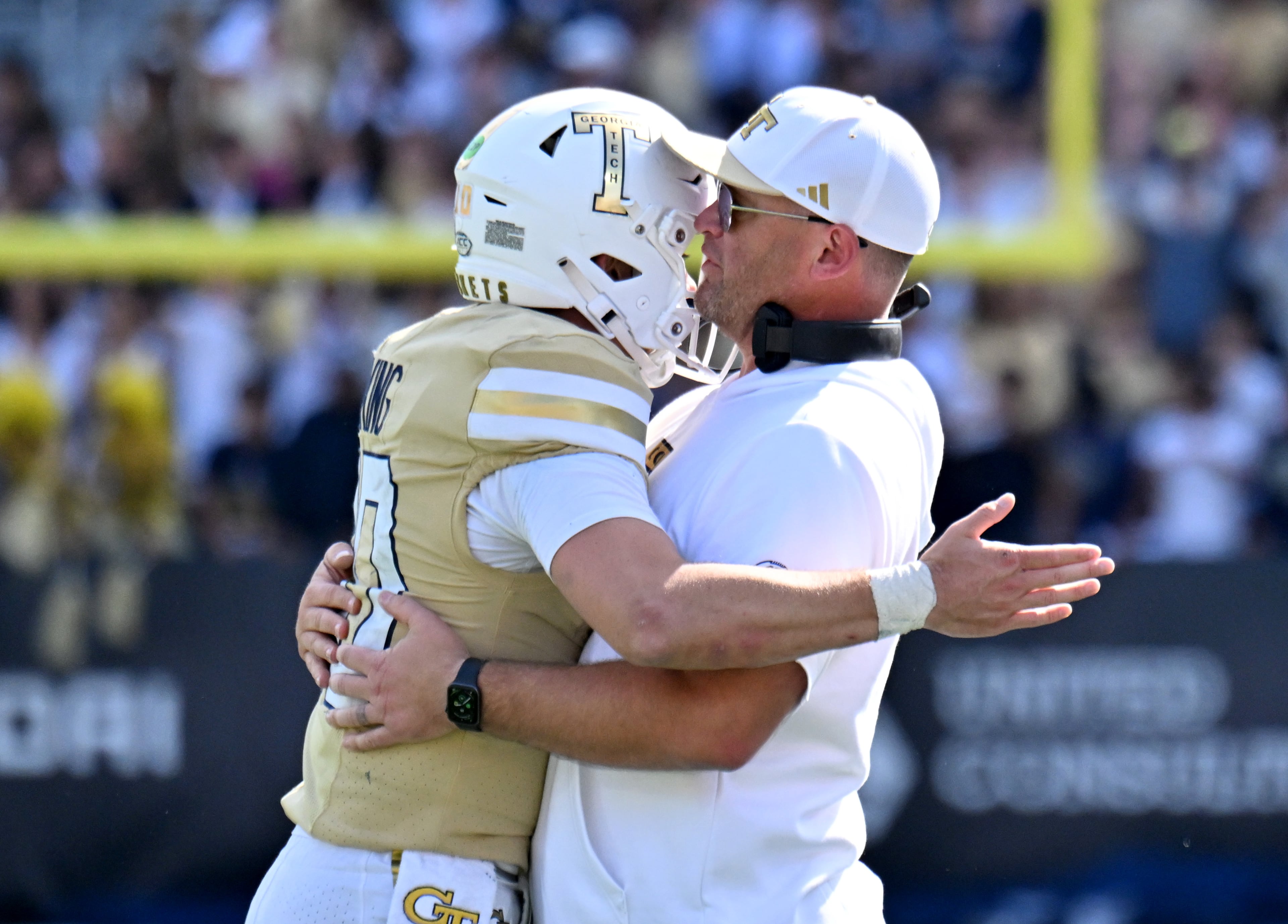 Georgia Tech quarterback Haynes King (left) celebrates with Georgia Tech head coach Brent Key after scoring a touchdown during the second half in an NCAA college football game at Bobby Dodd Stadium, Saturday, Oct. 25, 2025 in Atlanta. Georgia Tech won 41-16 over Syracuse. The Yellow Jackets are 8-0 for the first time since 1966 and 5-0 in the ACC for the first time ever. (Hyosub Shin/AJC)