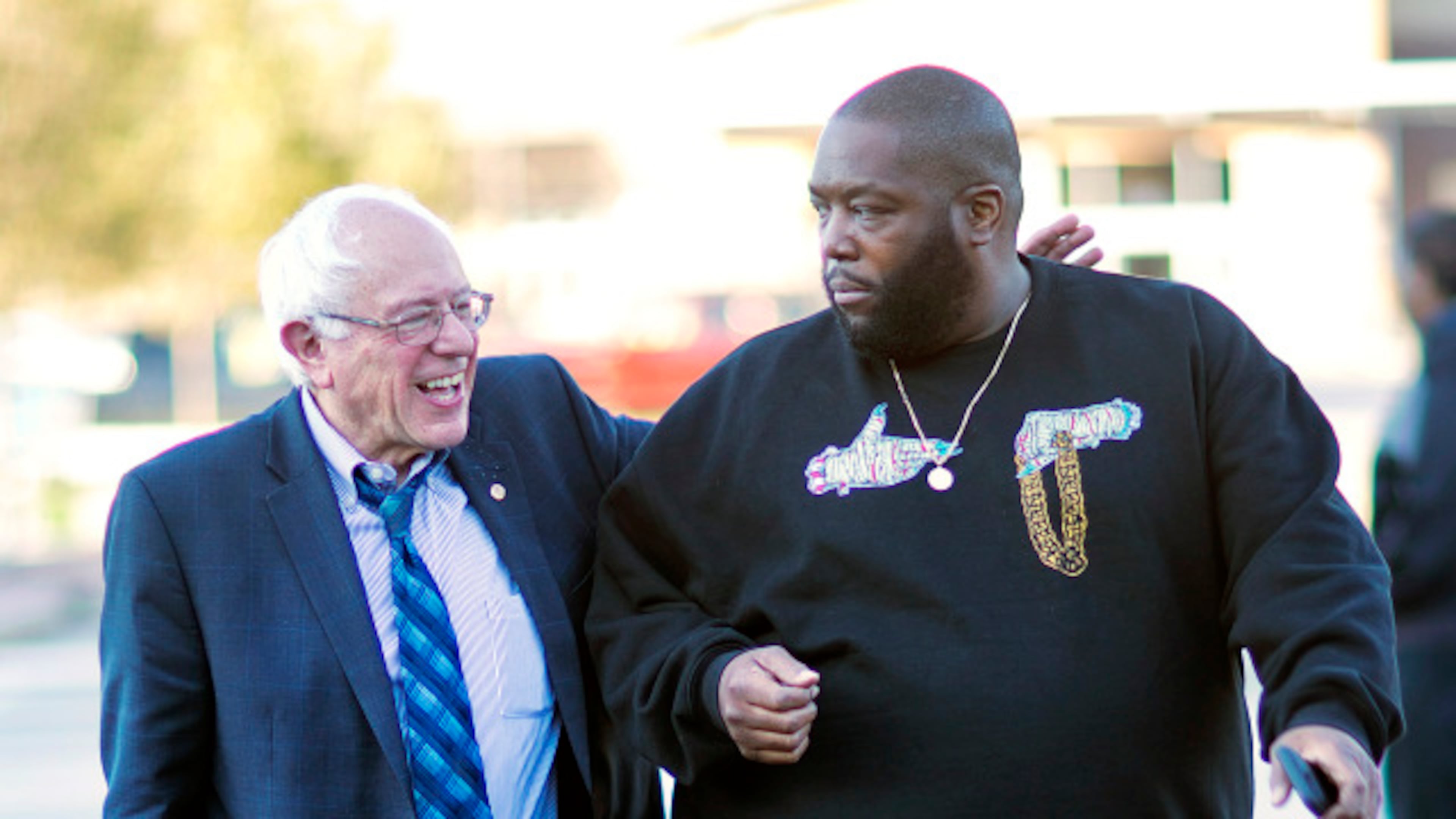 Sen. Bernie Sanders, I-Vt. left, walks in with rapper Killer Mike for a visit to the Busy Bee Café in Atlanta.