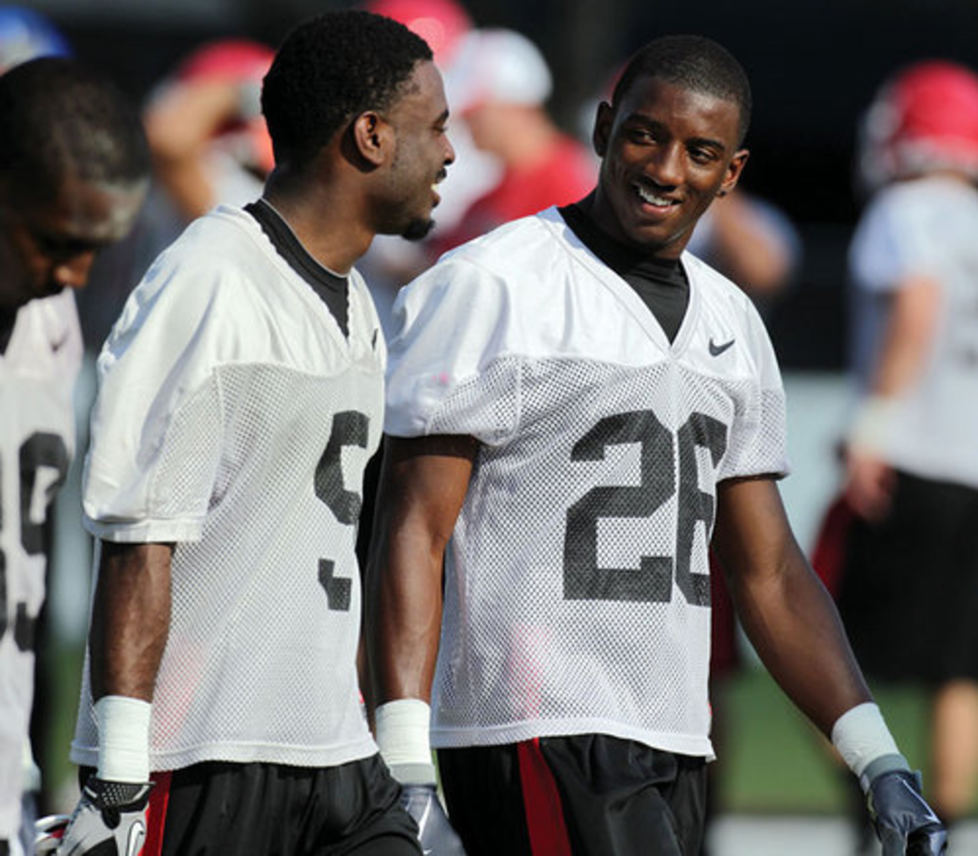 UGA cornerback Damian Swann (left) and SE Malcolm Mitchell (right) share a laugh.