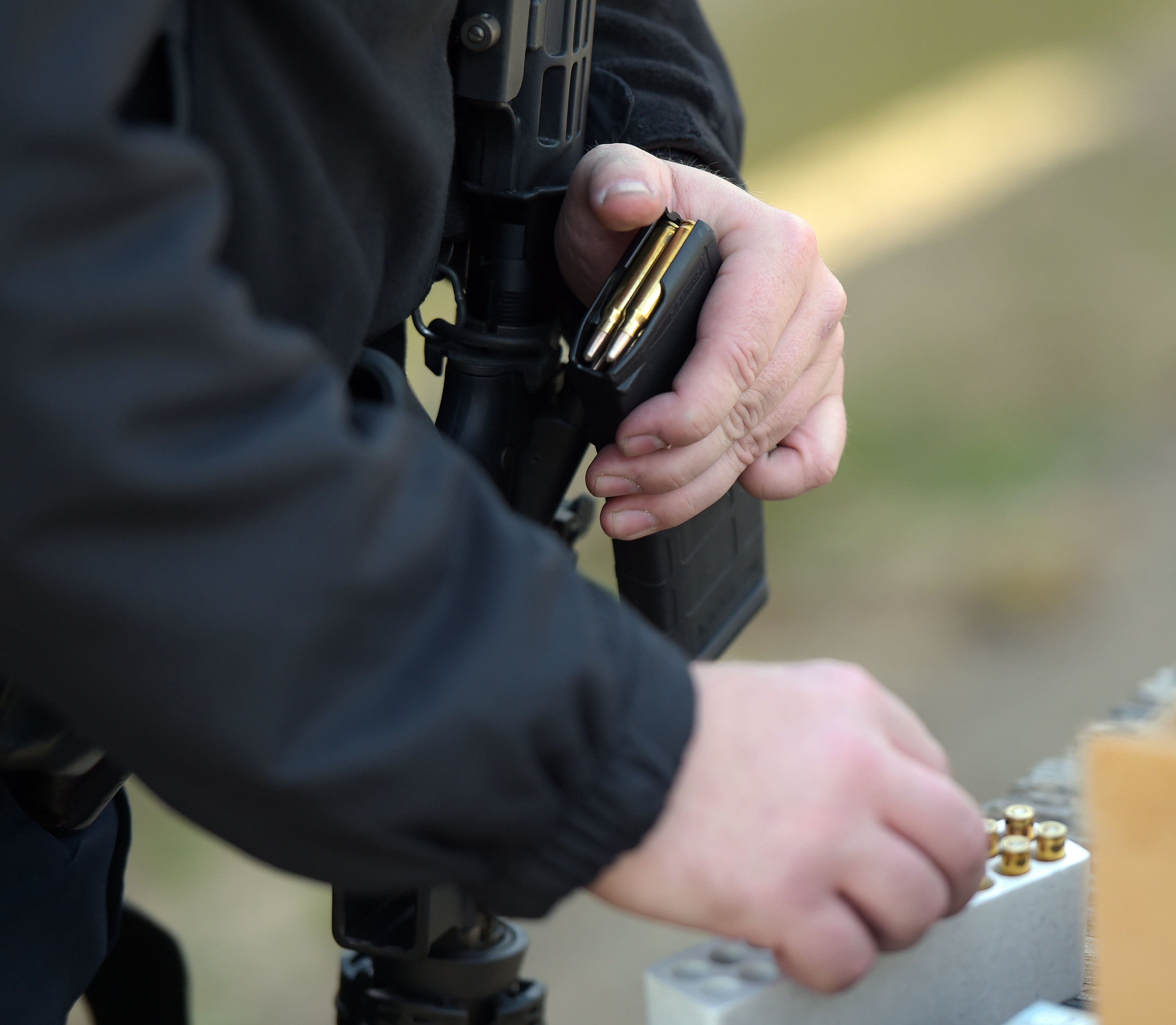 NOVEMBER 24, 2015 ATLANTA Senior Patrol Officer A. Moline reloads his clip. Officers with the Atlanta Police Department conduct advanced patrol rifle training at its firearms range Tuesday, November 24, 2015. KENT D. JOHNSON/ kdjohnson@ajc.com