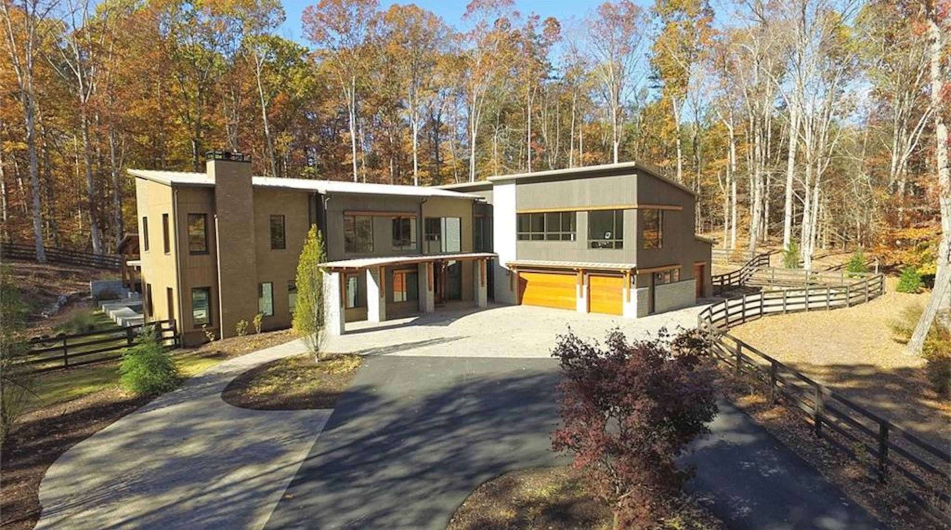 This modern estate at 4056 Hog Mountain Road in Hoschton is listed for $2.195 million. (Photos via zillow.com)