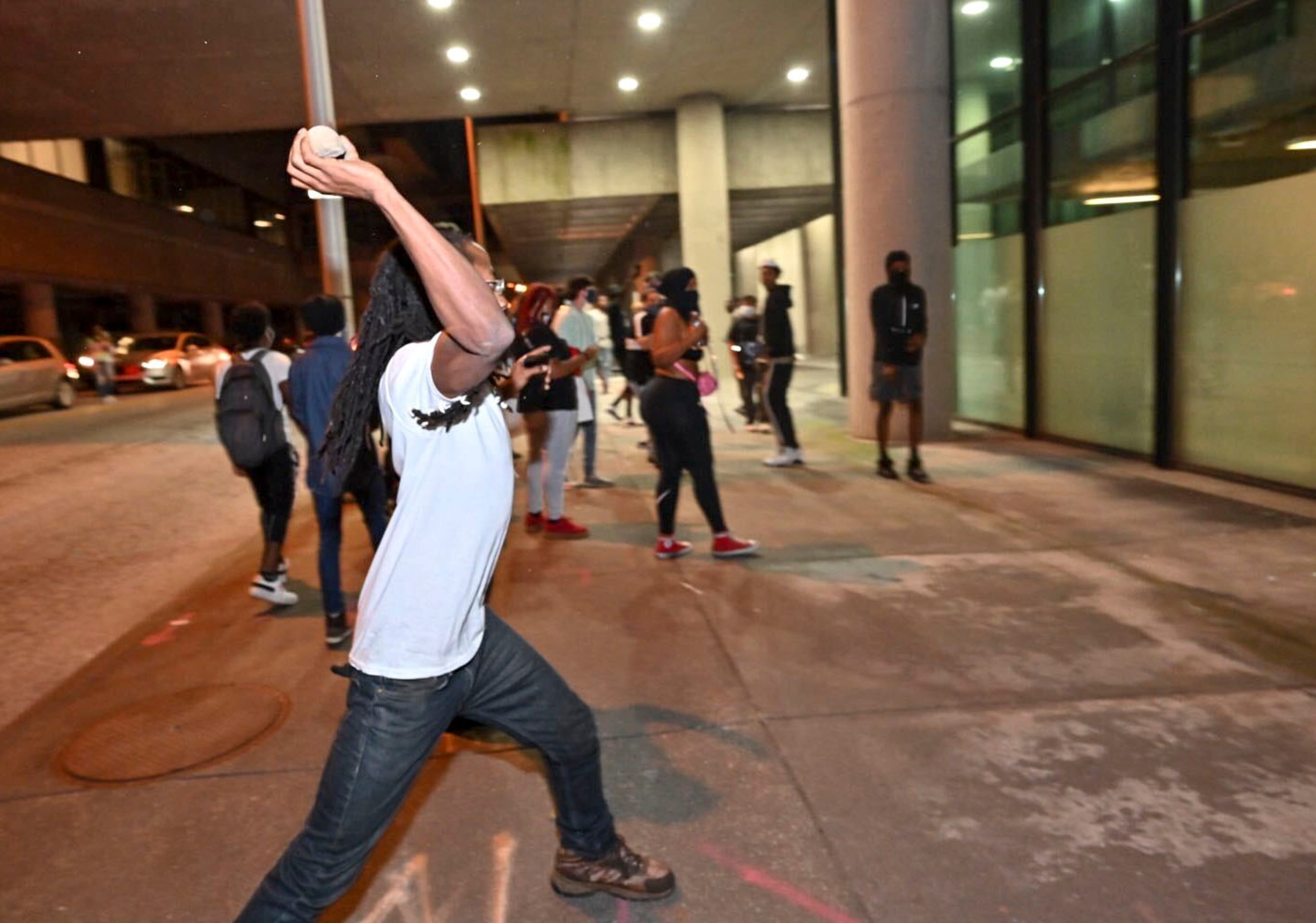 May 30, 2020 - Atlanta - Protesters attacking Police Zone 5 downtown. Small groups of people roam the streets after curfew Saturday, some vandalizing property, as protests began for a second day. Protests over the death of George Floyd in Minneapolis police custody spread around the United States on Saturday, as his case renewed anger about others involving African Americans, police and race relations. Hyosub Shin / hyosub.shin@ajc.com
