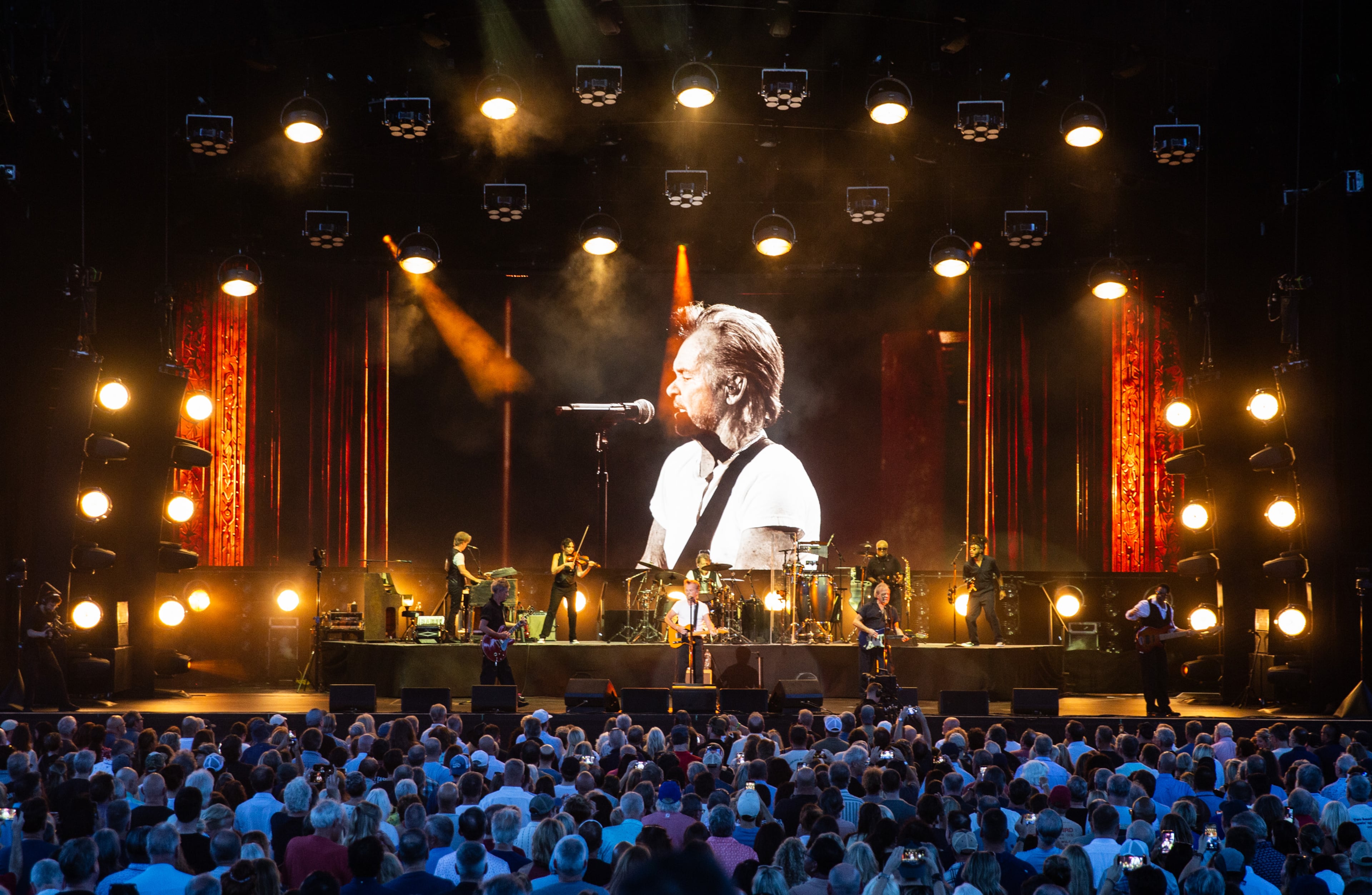 Alpharetta. GA: John Mellencamp visited America Bank Amphitheatre on his Dancing Words tour Saturday night. Running through two acts, with a 15 minute intermission, Mellencamp played nearly forty songs to a sing-along crowd. Photo taken Thursday August 1, 2026 at Ameris Bank Amphitheatre. Mellencamp (RYAN FLEISHER FOR THE ATLANTA JOURNAL-CONSTITUTION)
