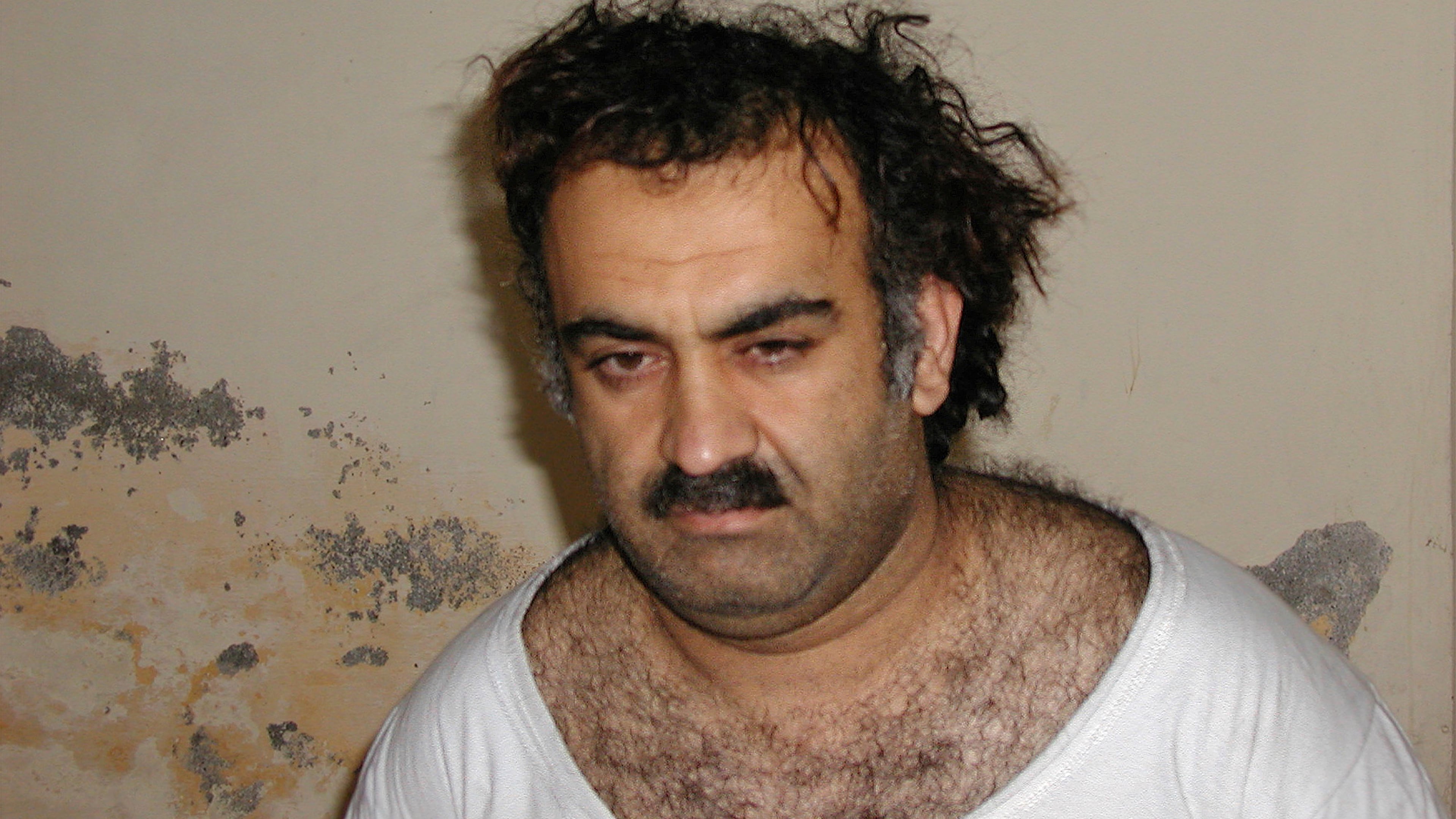 FILE- Khalid Sheikh Mohammed, the alleged Sept. 11 mastermind, is seen shortly after his capture during a raid in Pakistan, March 1, 2003, in this photo obtained by the Associated Press. (AP Photo, File)