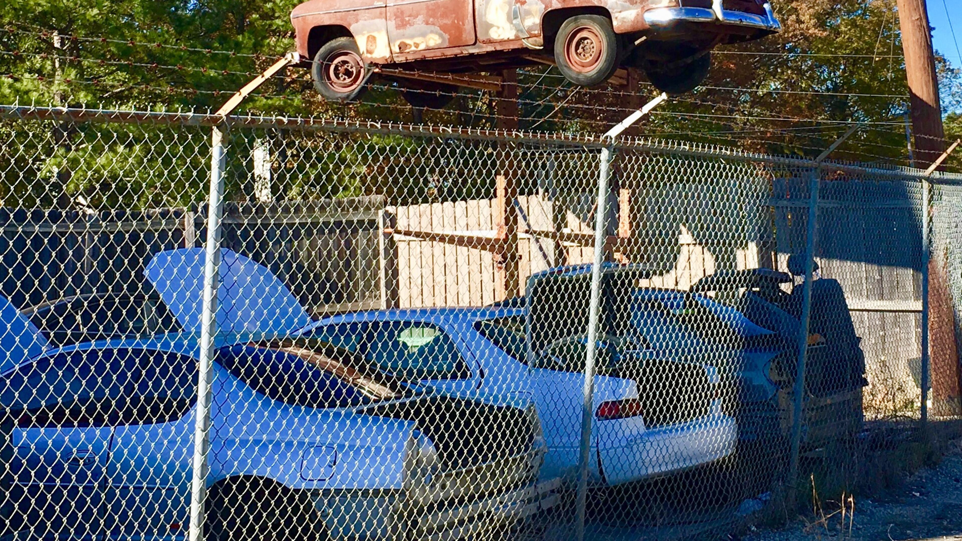 This is a portion of the 9.71 acres tentatively slated for a development that would include 289 apartments and possibly a Publix grocery between East Ponce de Leon Avenue and North Arcadia Drive. All the properties located within are currently zoned light industrial and include this automobile junk yard, a tire repair business, plumbing business and a vacant store among others. Bill Banks file photo for the AJC