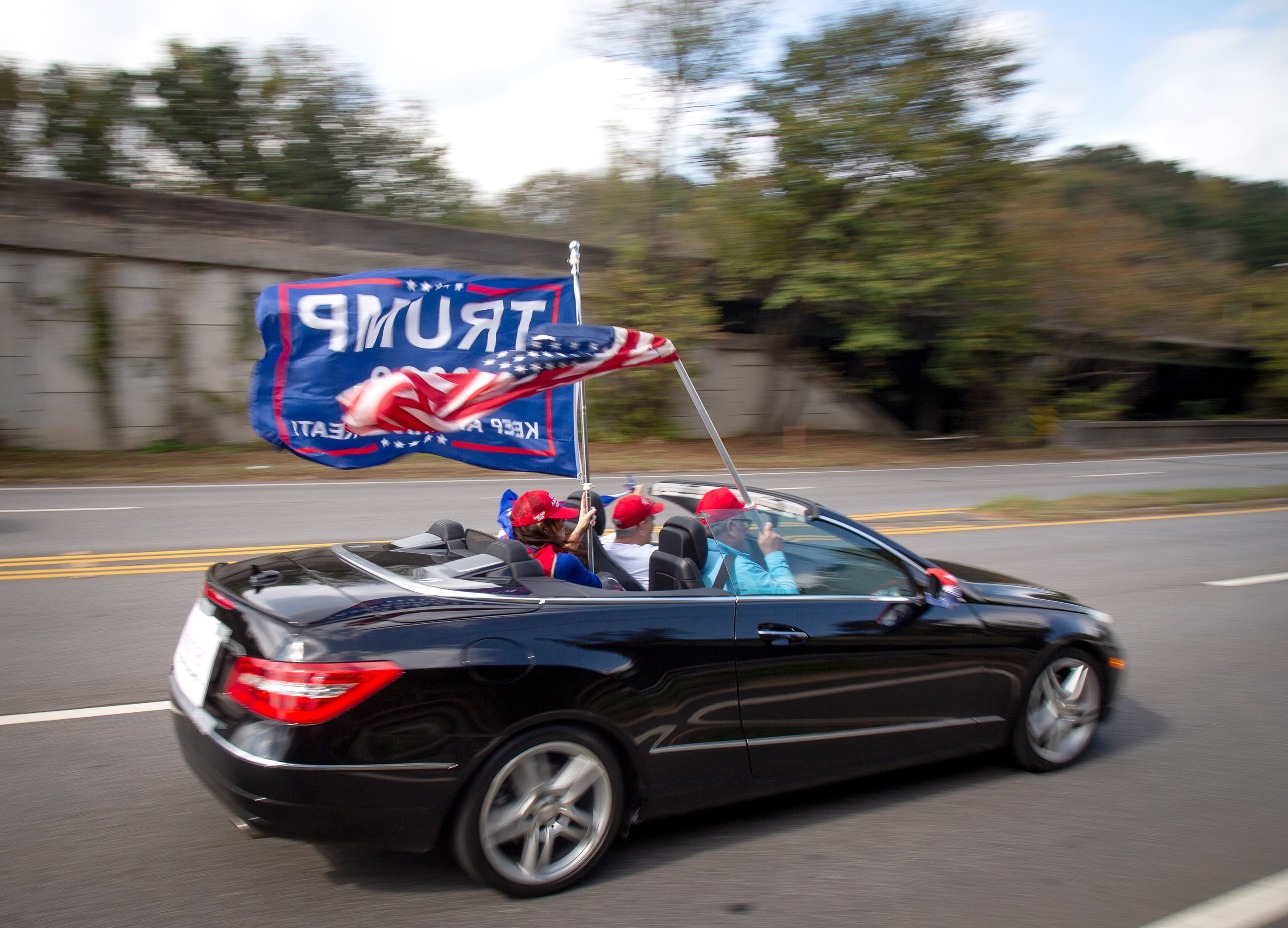 Trump supporters head up Northside Parkway for the I-75 MAGA Drag the Interstate rally Sunday, November 1, 2020. Caravans were scheduled around Georgia and the U.S. on Sunday. (Photo: Steve Schaefer for The Atlanta Journal-Constitution)