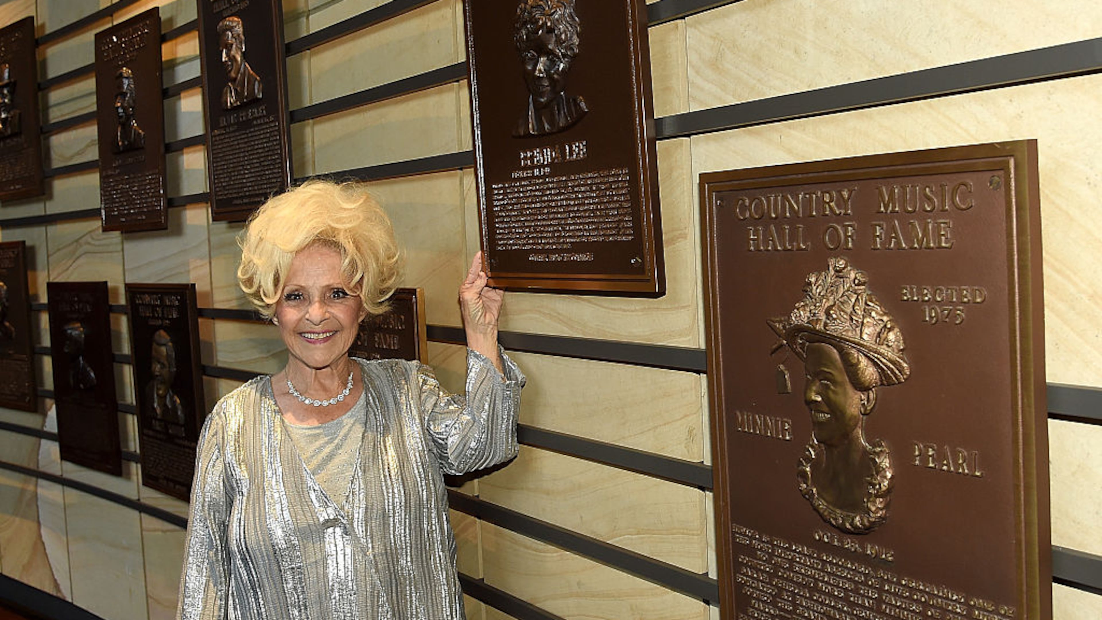 Vocalist Brenda Lee poses with her plaque at The Country Music Hall of Fame & Museum during the 2016 CMA Music Festival at Country Music Hall of Fame and Museum on June 11, 2016 in Nashville, Tenn.. (Photo by Rick Diamond/Getty Images for Country Music Hall of Fame & Museum)