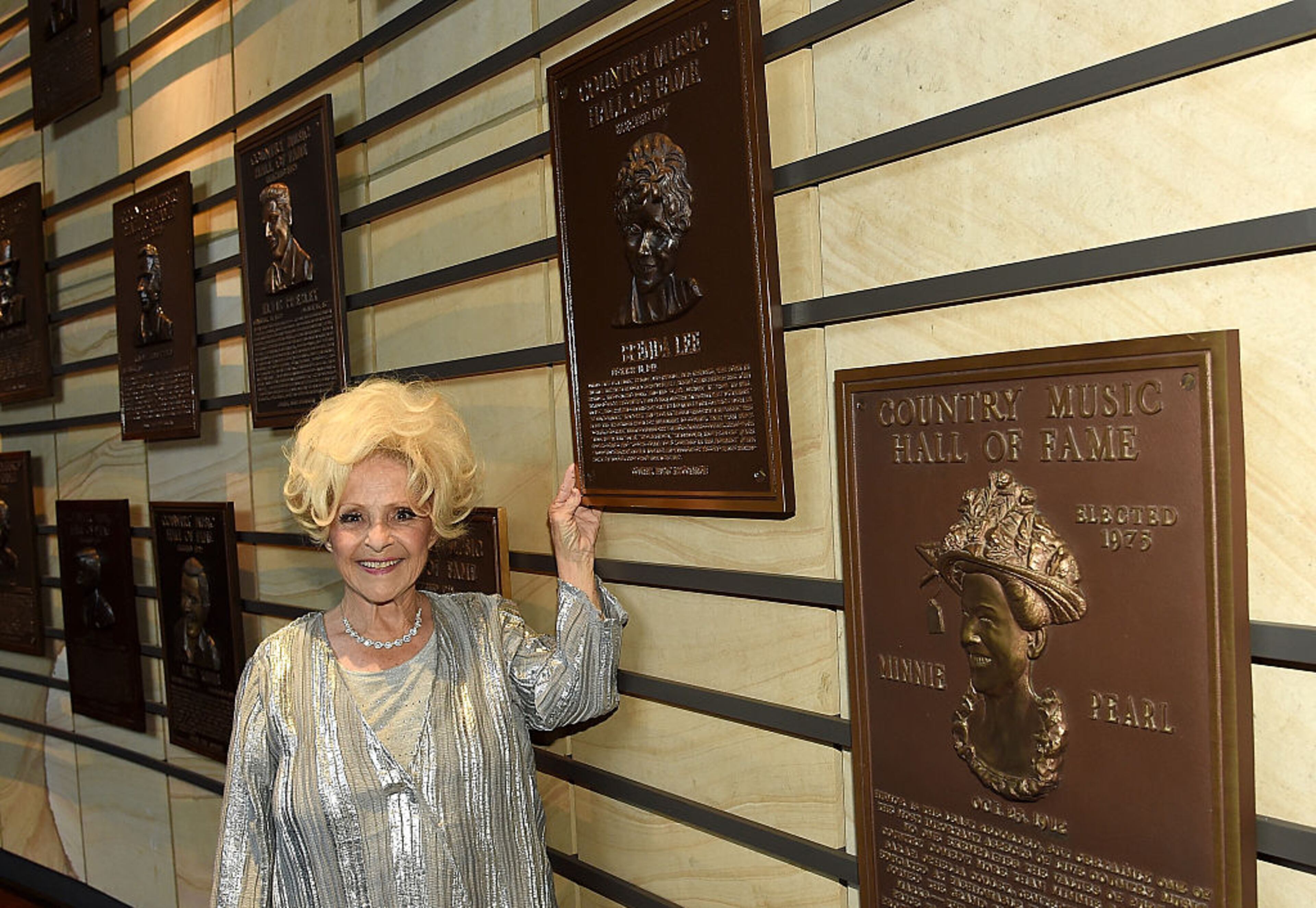 Vocalist Brenda Lee poses with her plaque at The Country Music Hall of Fame & Museum during the 2016 CMA Music Festival at Country Music Hall of Fame and Museum on June 11, 2016 in Nashville, Tenn.. (Photo by Rick Diamond/Getty Images for Country Music Hall of Fame & Museum)