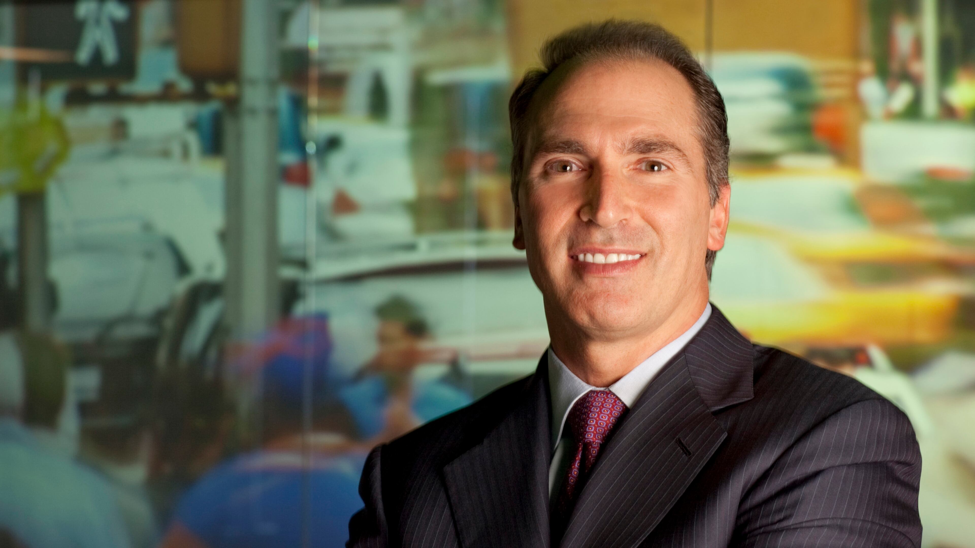 NCR's top executive, Bill Nuti, works out of New York but says the company is committed to Atlanta and its plan for a new headquarters in Midtown.