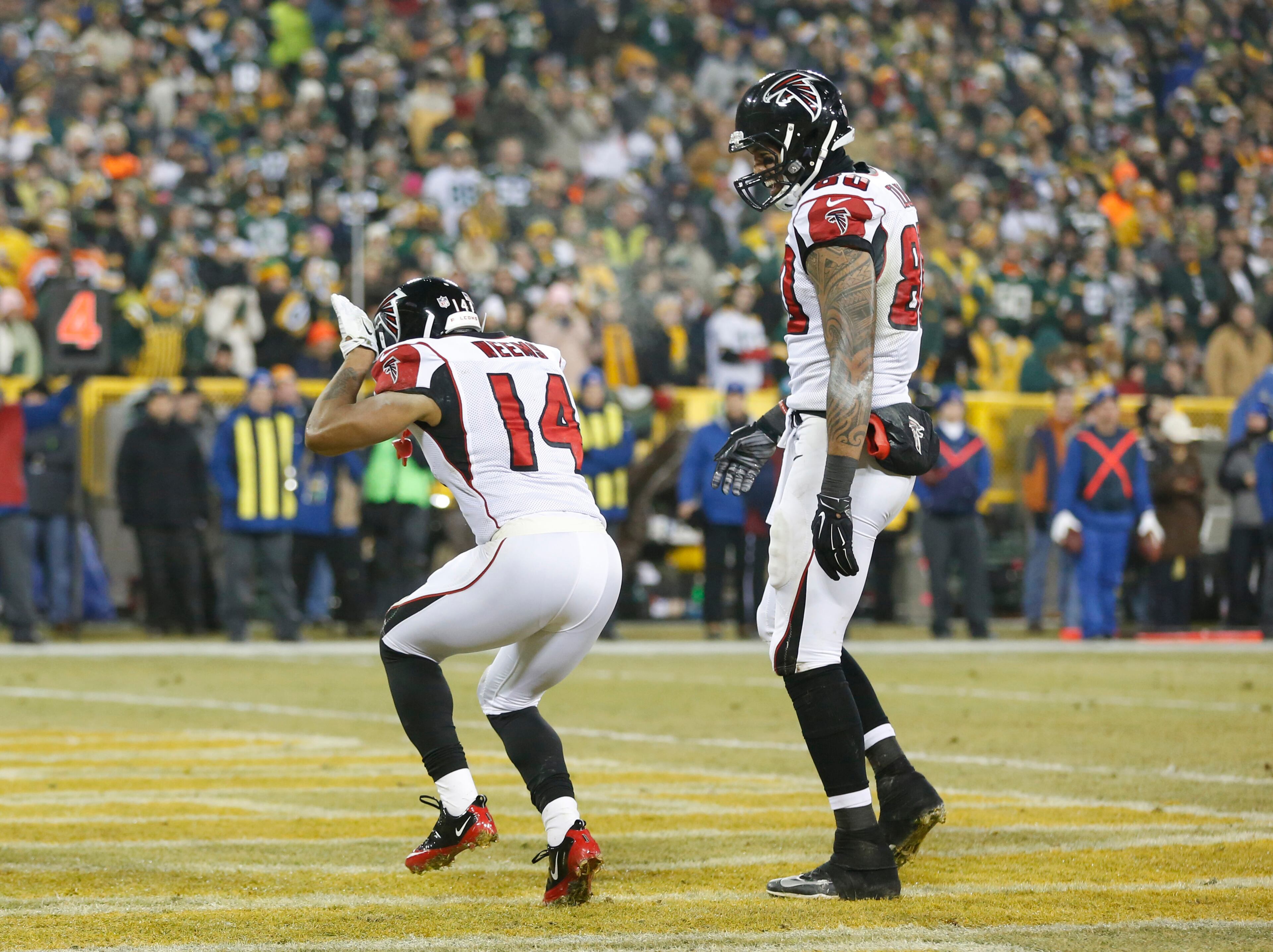 Atlanta Falcons' Eric Weems celebrates with a dance after a touchdown catch during the second half against the Green Bay Packers Monday, Dec. 8, 2014, in Green Bay, Wis.
