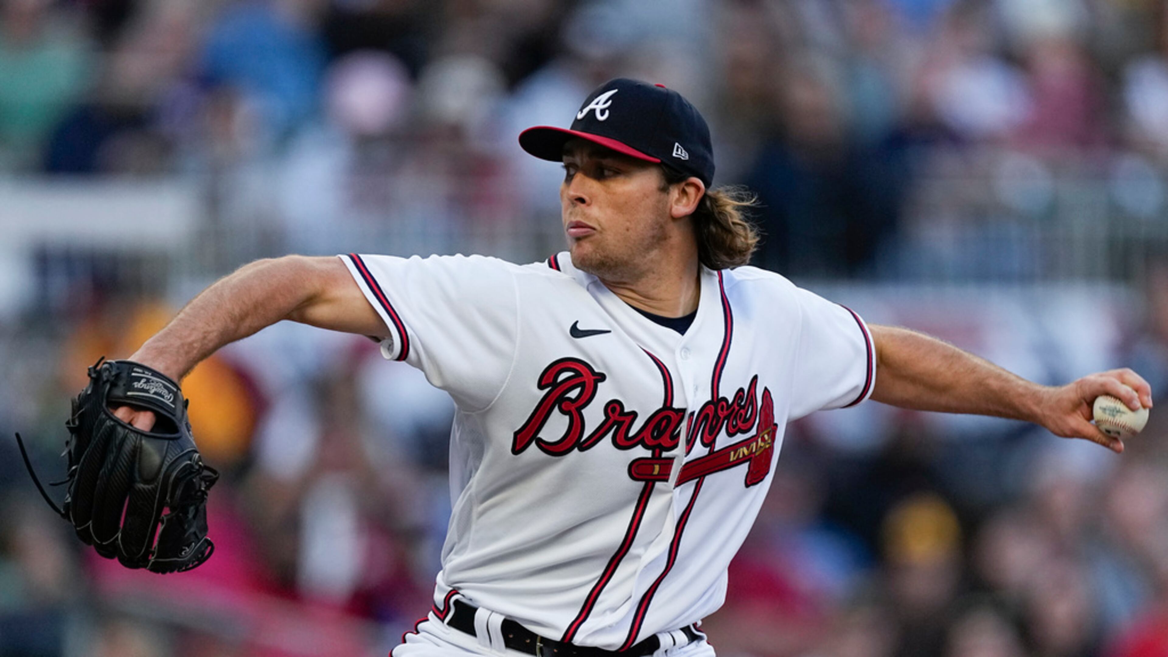 Atlanta Braves starting pitcher Dylan Dodd (46) throws in the first inning of a baseball game against the San Diego Padres, Sunday, April 9, 2023, in Atlanta. (AP Photo/John Bazemore)
