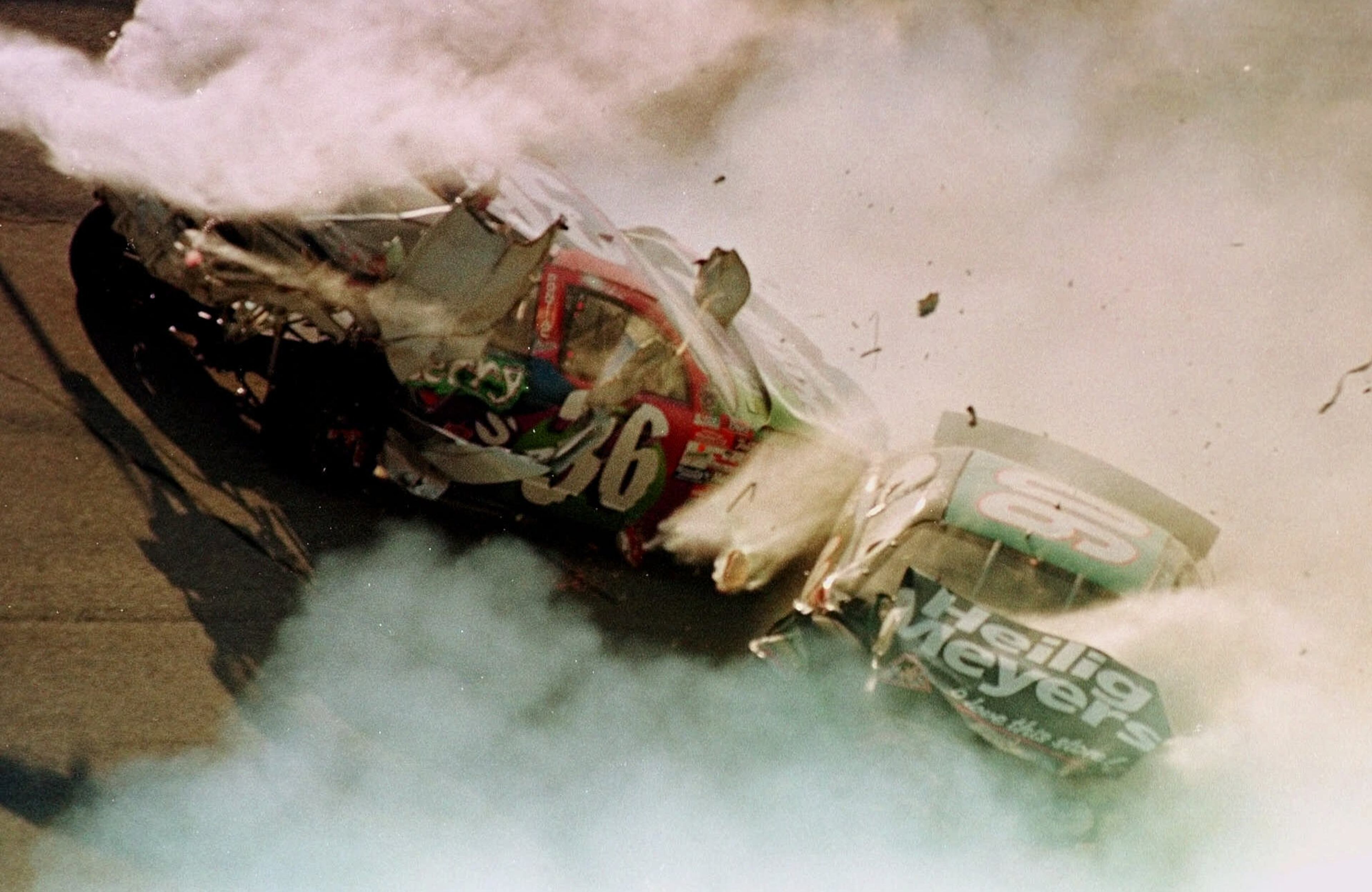 The car of Ernie Irvan (36) of Salinas, Calif., is hit by the car of Dick Trickle (90) of Wisconsin Rapids, Wis., in turn one of the Talladega Superspeedway during the Winston 500 on Sunday, Oct. 11, 1998, in Talladega, Ala. Irvan was airlifted to a Birmingham hospital after the incident. Dale Jarrett won the race, and scored a $1 million bonus. (AP Photo/Dave Martin)