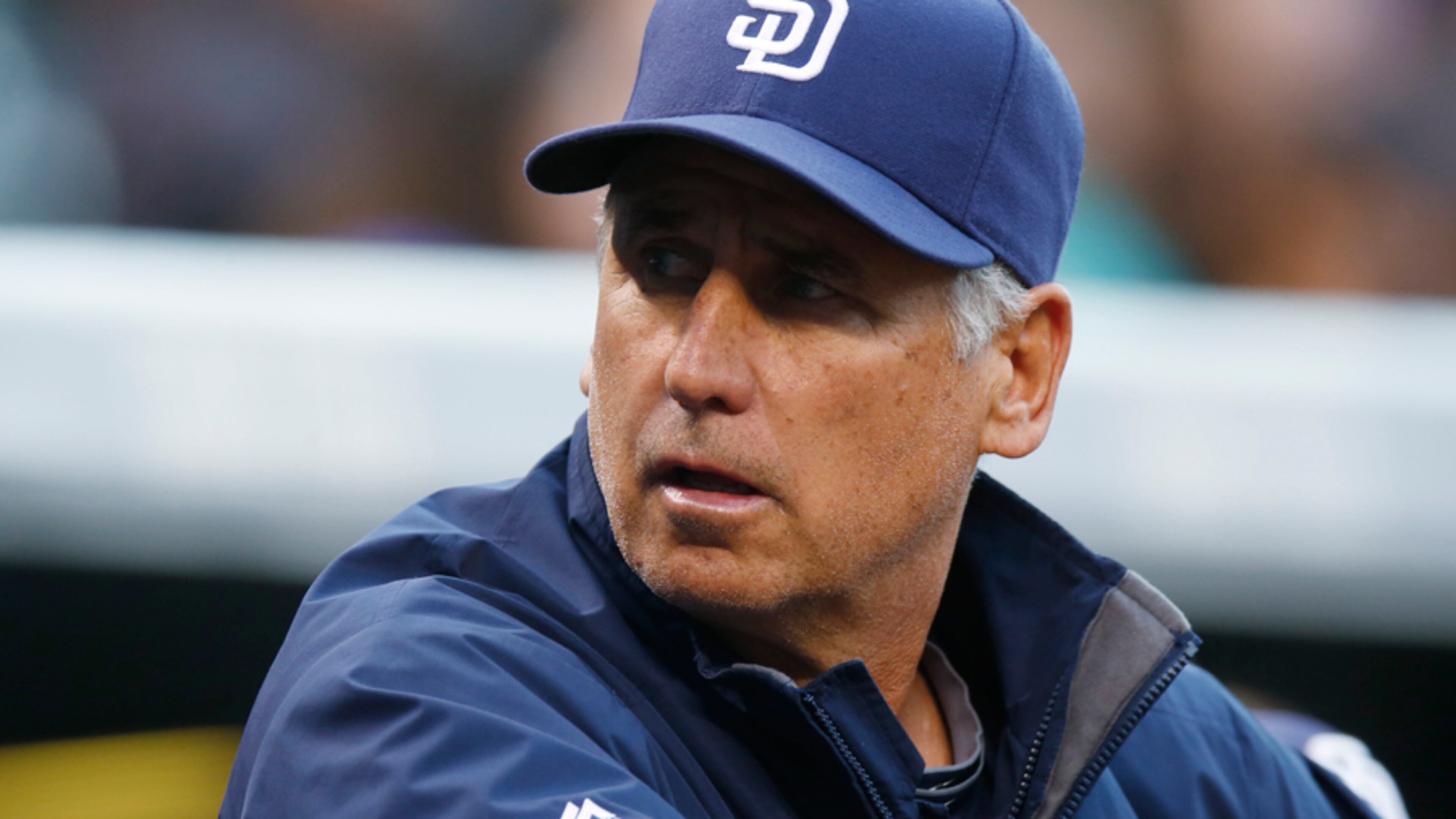 San Diego Padres manager Bud Black (20) looks on against the Colorado Rockies in the first inning of a baseball game Wednesday, April 22, 2015, in Denver. (AP Photo/David Zalubowski)