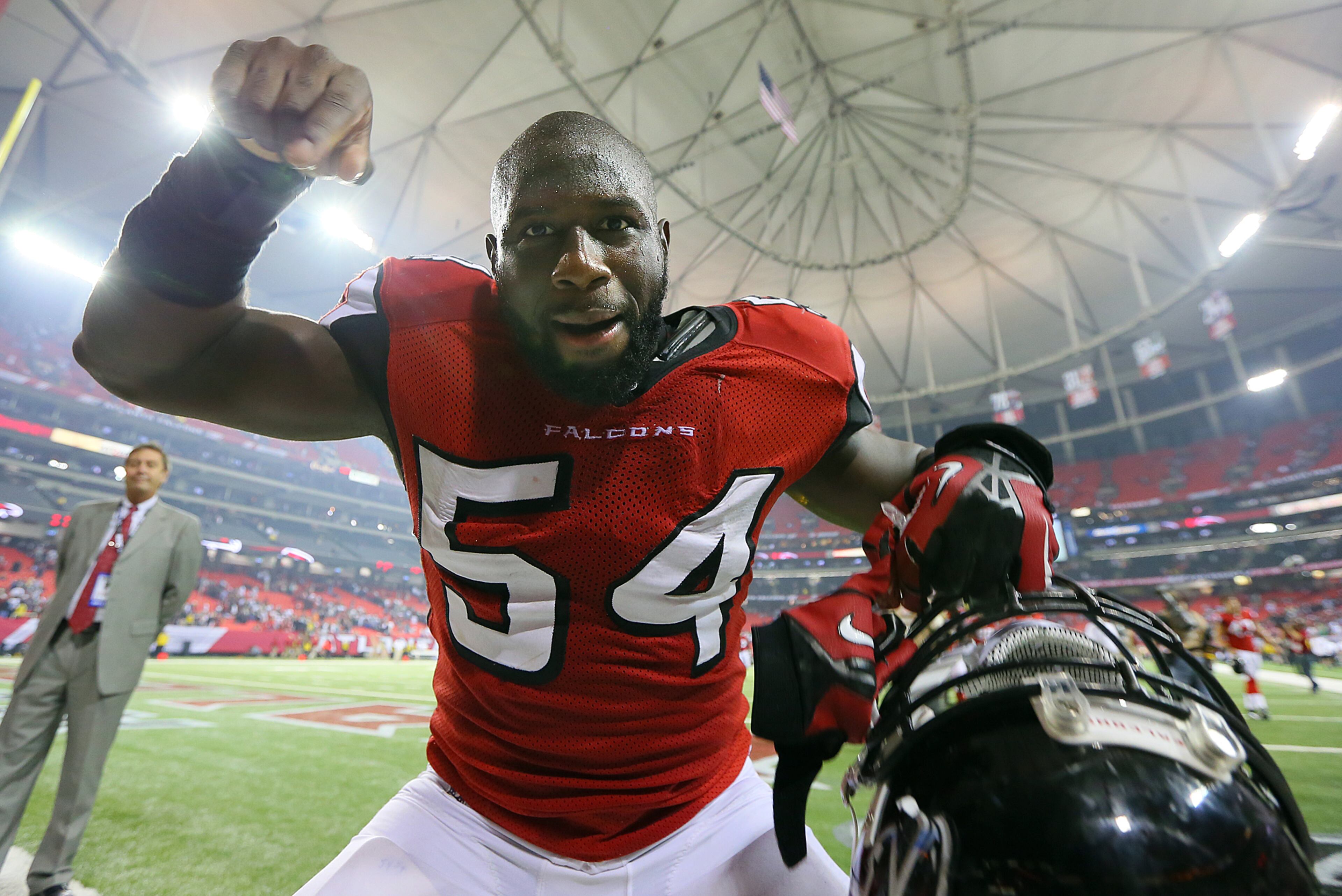 110412 ATLANTA: Falcons linebacker Stephen Nicholas celebrates defeating the Cowboys 19-13 to remain undefeated at the Georgia Dome in Atlanta on Sunday, Nov. 4, 2012. CURTIS COMPTON / CCOMPTON@AJC.COM