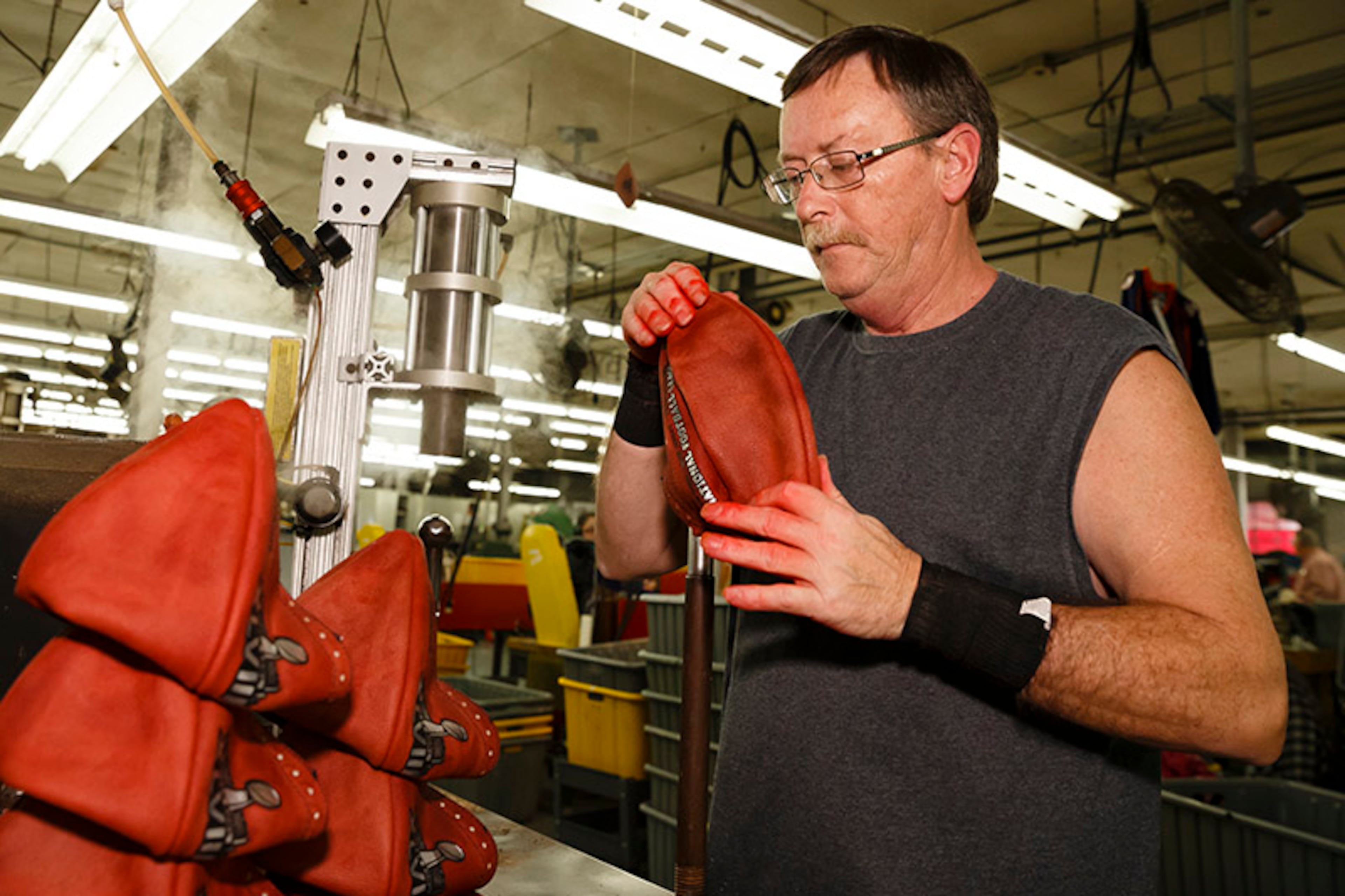 As Mark Connelly turns the official game ball, they start taking the familiar shape.