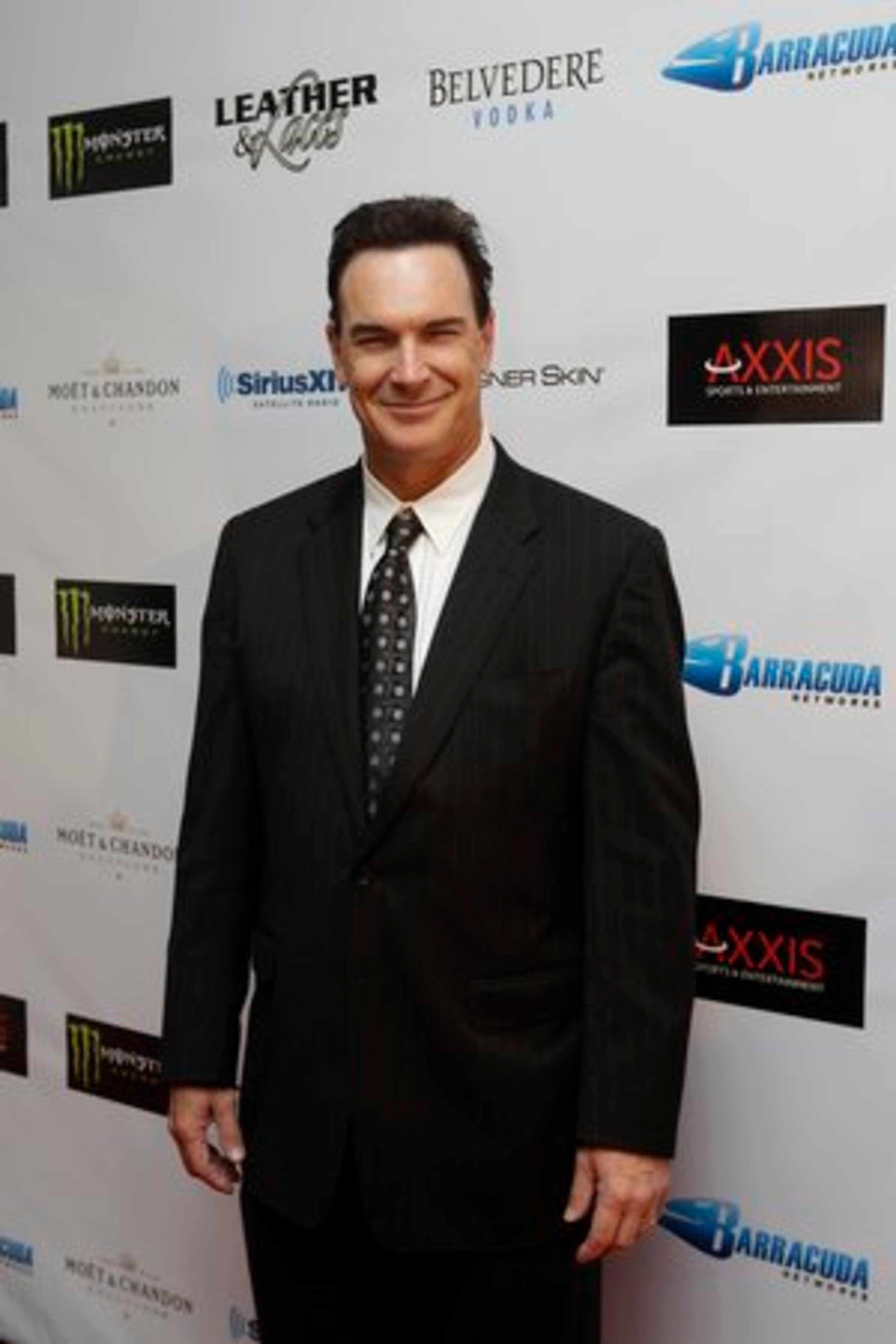 "Rules of Engagement" star Patrick Warburton dropped by after attending the NFL Alumni awards.