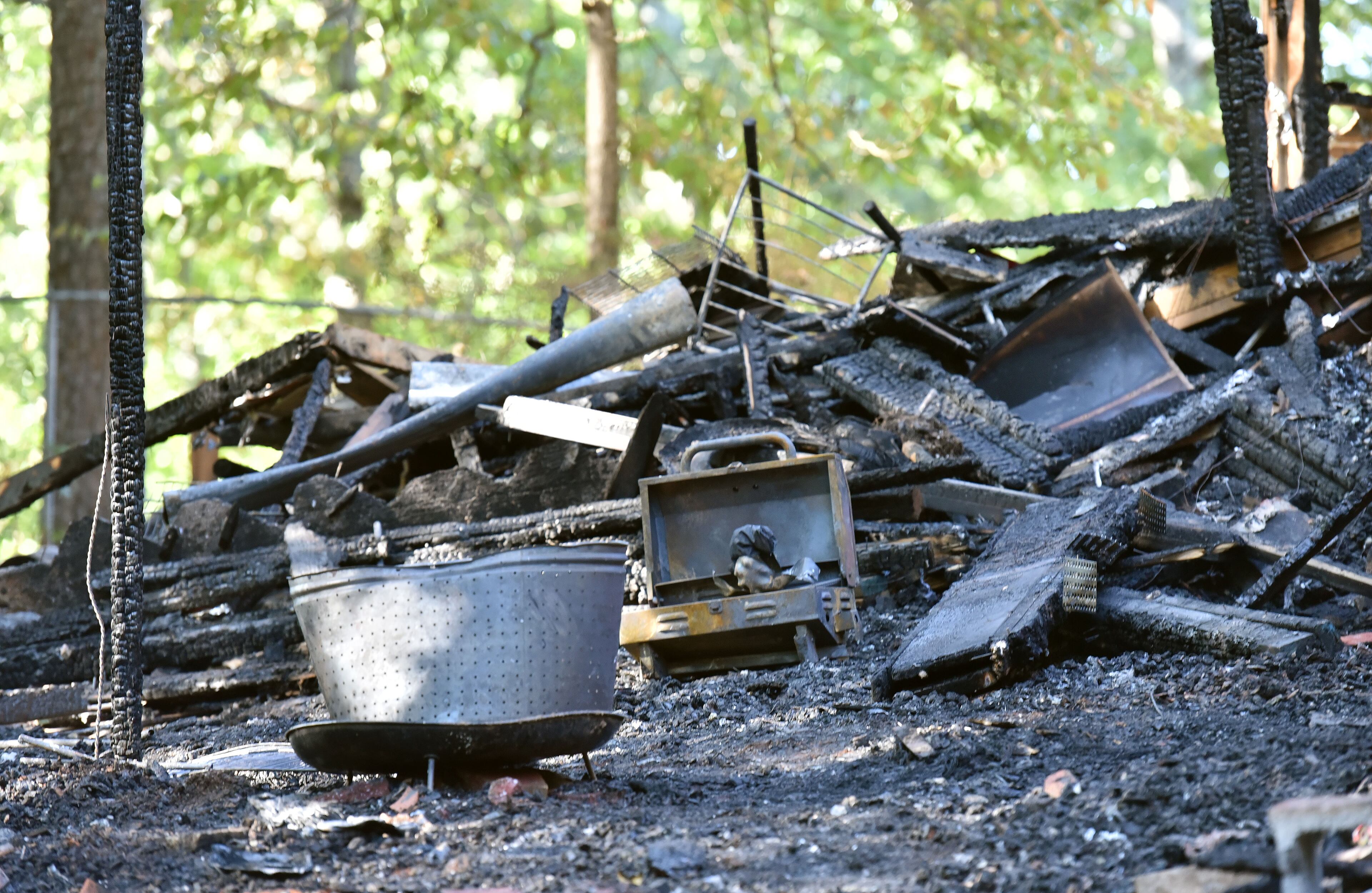 October 23, 2016 Duluth - Five adults were found dead after a fire gutted a home in the 2200 block of Post Oak Drive in unincorporated Duluth early Sunday morning on Sunday, October 23, 2016. Five people are dead after a fire gutted a home in unincorporated Duluth early Sunday morning, Gwinnett County fire officials said. Gwinnett County Department of Fire and Emergency Services Capt. Tommy Rutledge confirmed that five adults were found dead in the home in the 2200 block of Post Oak Drive NW, a two-story structure in the middle of a dead-end street near Old Peachtree Road. HYOSUB SHIN / HSHIN@AJC.COM