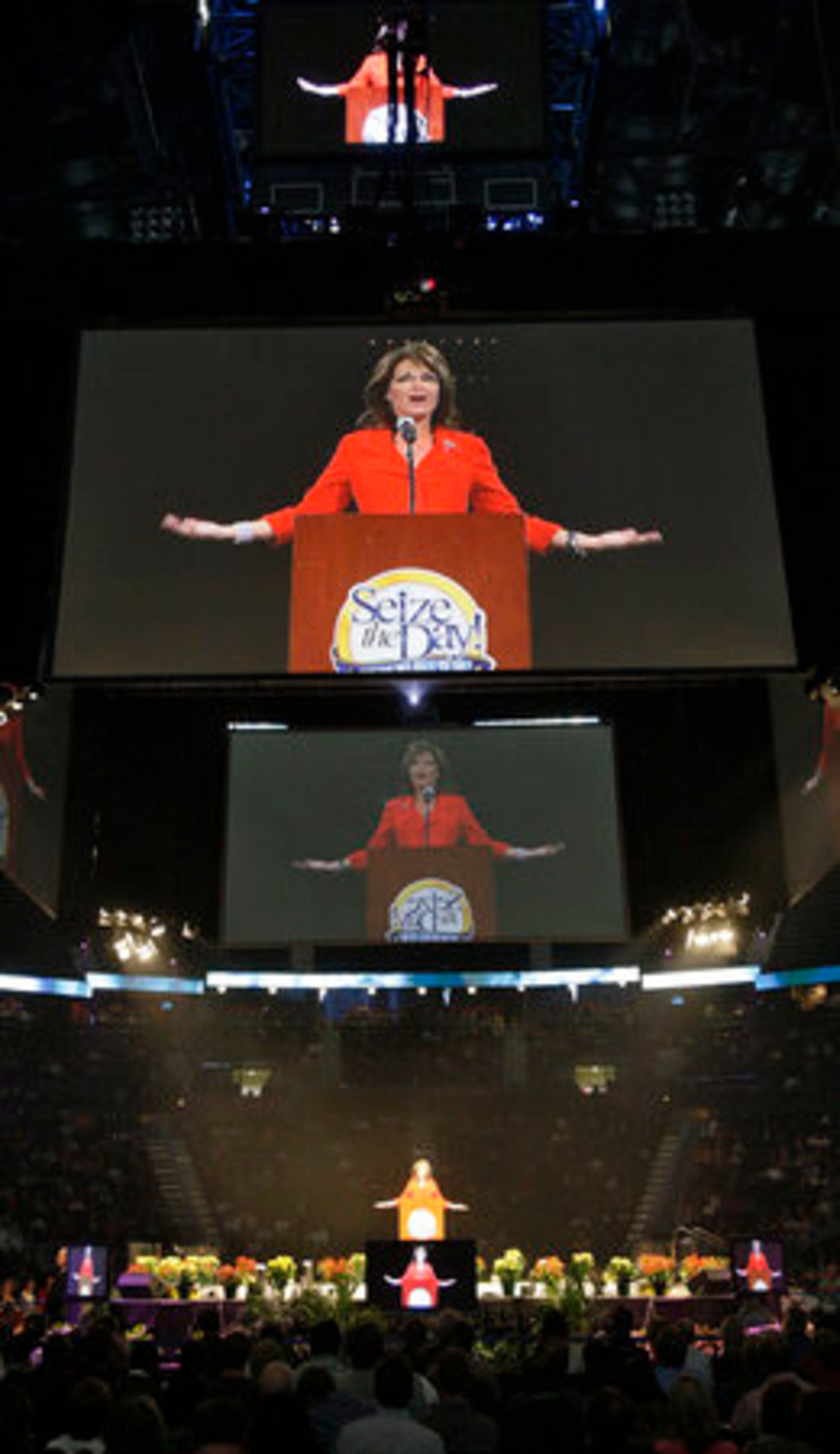 Sarah Palin addresses the "Seize the Day" crowd at Philips Arena, which was about half full. Her theme was on overcoming obstacles.