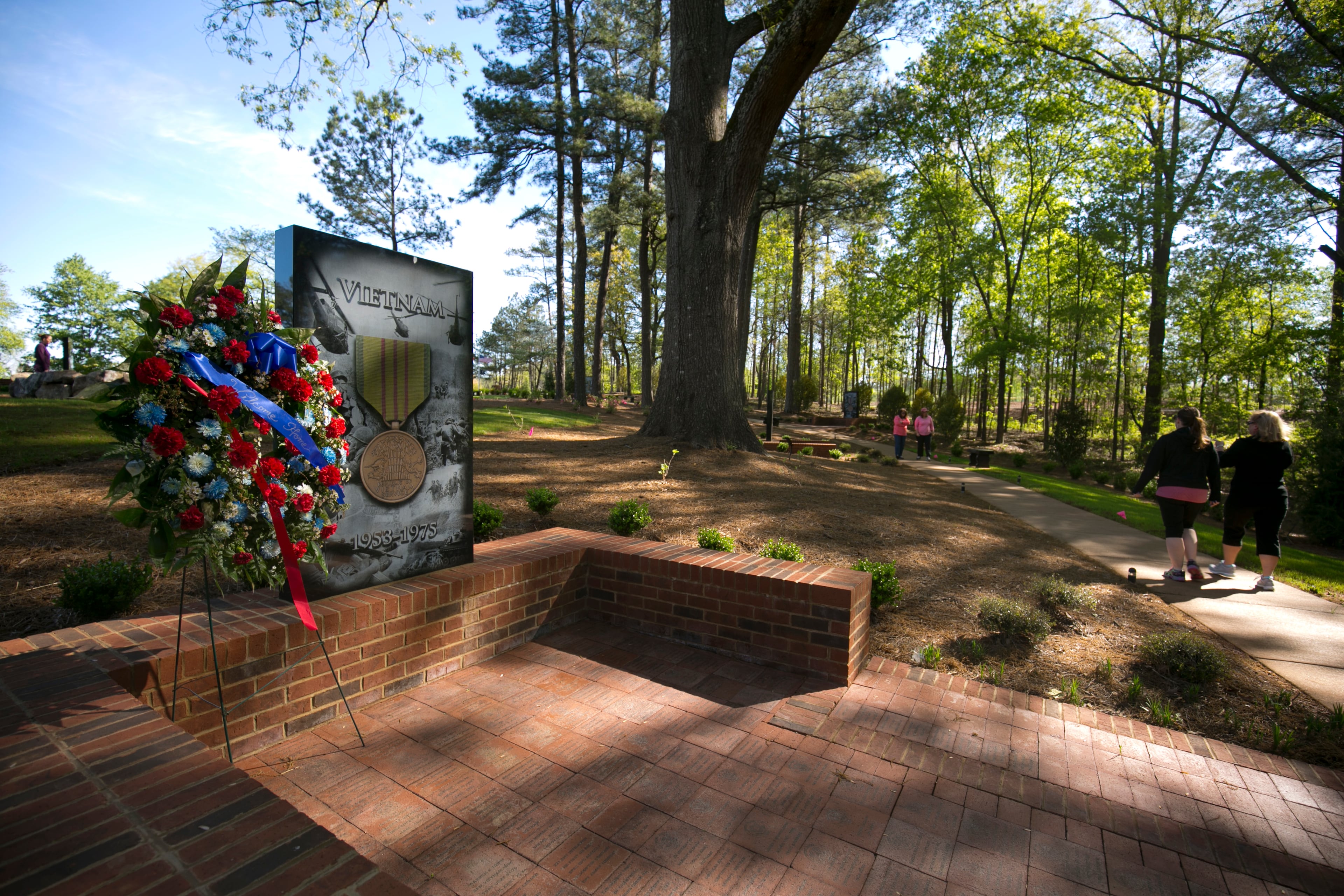 April 2, 2016 - Johns Creek, Ga: A wreath is shown next to the Vietnam memorial at the Veteran's Memorial Park at Newtown Park Saturday, April 2, 2016, in Johns Creek, Ga. This is for the insider's guide feature about the Newtown neighborhood. PHOTO / JASON GETZ