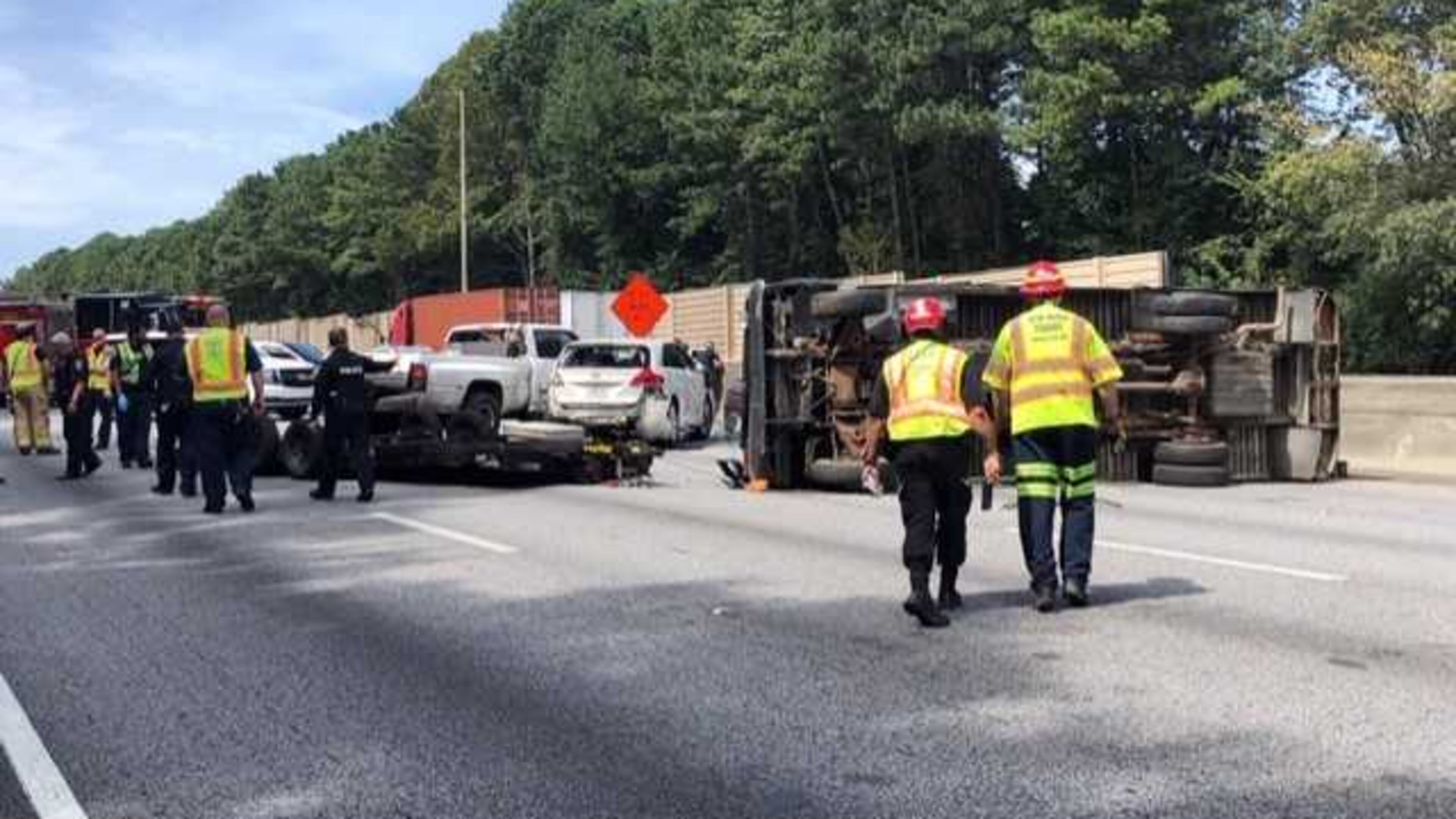 I-75 South was temporarily shut down Tuesday afternoon after a truck overturned in Clayton County, police said.
