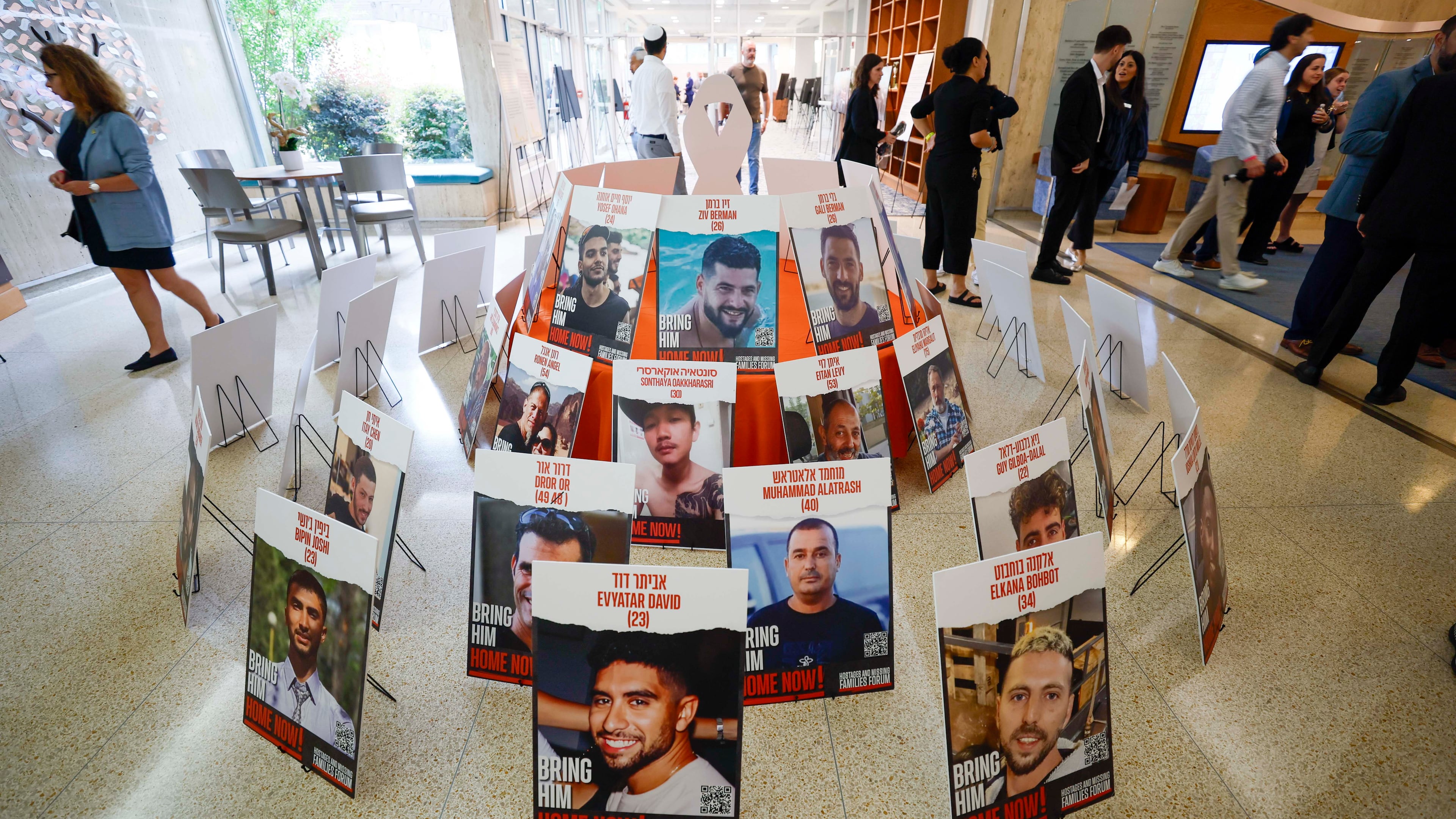 Photographs of hostages are displayed inside the Ahavath Achim Synagogue as members of metro Atlanta's Jewish community gather on Sunday, Oct. 5, 2025, to mark the second anniversary of the Oct. 7 attacks against Israel. (Miguel Martinez/AJC)