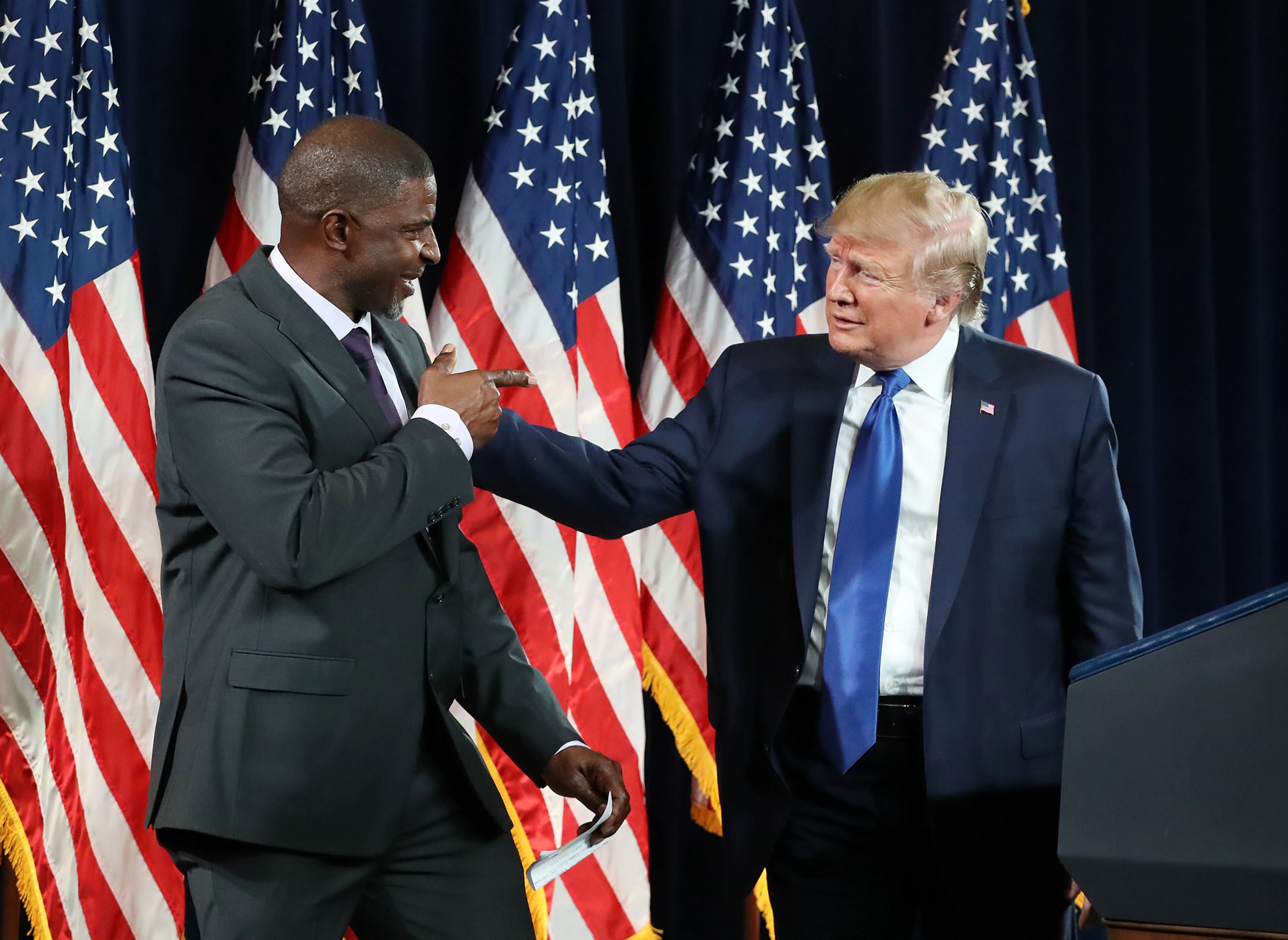 November 8, 2019 Atlanta: Paul Morrow, a concrete business owner, joins the stage with President Donald Trump during the Black Voices for Trump Coalition Rollout on Friday, November 8, 2019, in Atlanta. Curtis Compton/ccompton@ajc.com
