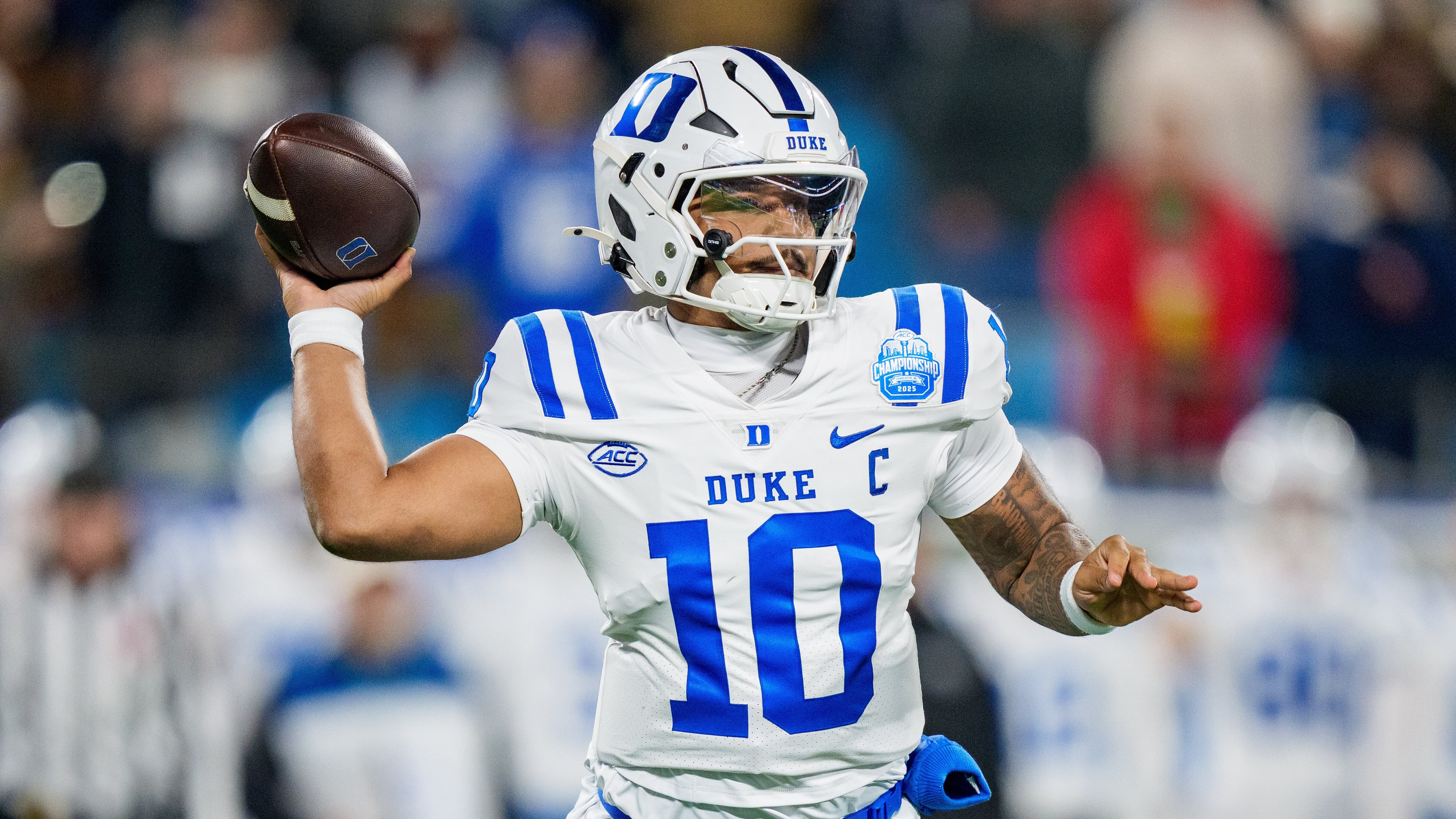 FILE - Duke quarterback Darian Mensah looks to pass the ball against Virginia in the first half of the Atlantic Coast Conference championship NCAA college football game in Charlotte, N.C., Dec. 6, 2025. (AP Photo/Jacob Kupferman, File)