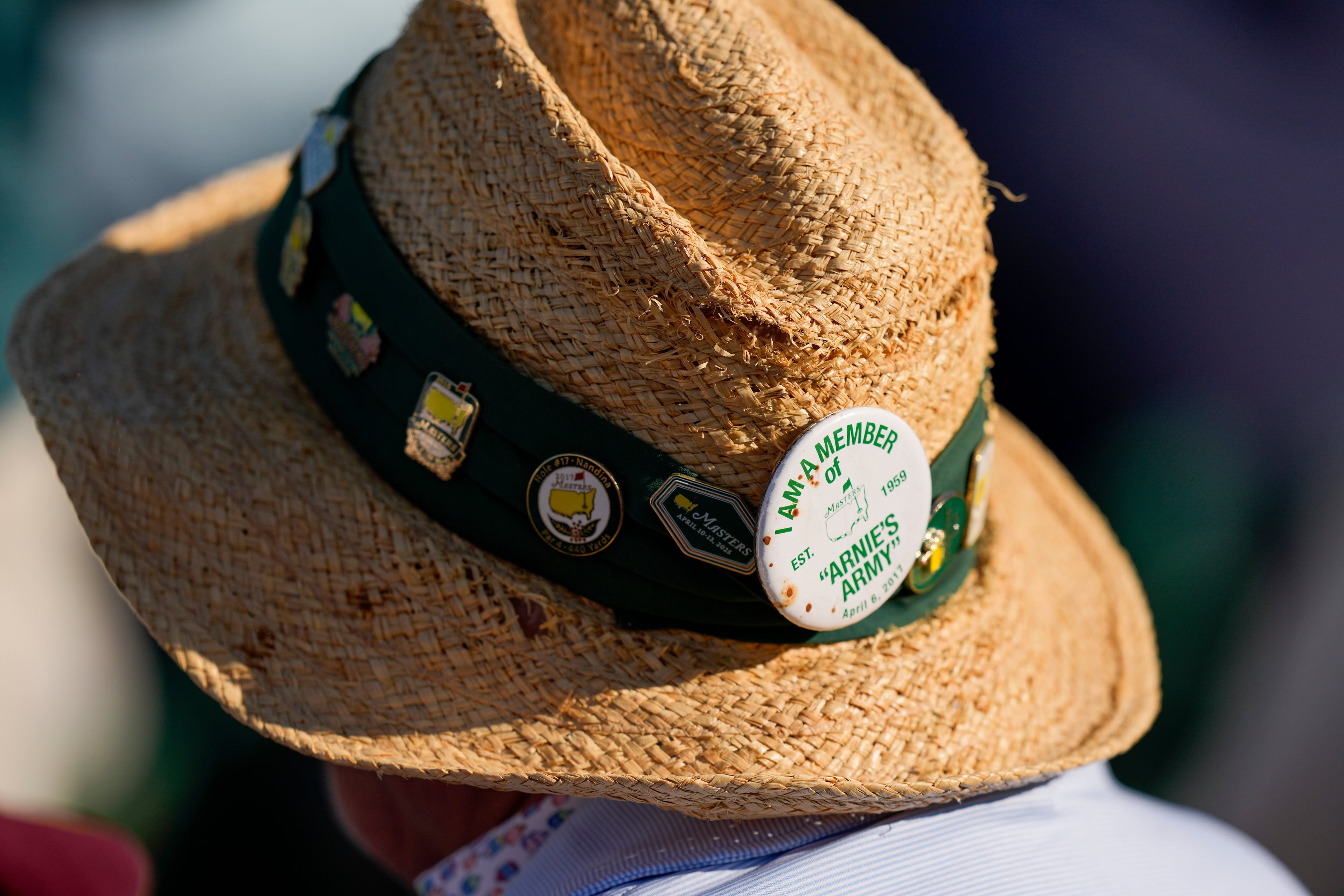 A patron watches on the second hole during the second round of the Masters golf tournament at the Augusta National Golf Club, Friday, April 10, 2026, in Augusta, Ga. (David J. Phillip/AP)