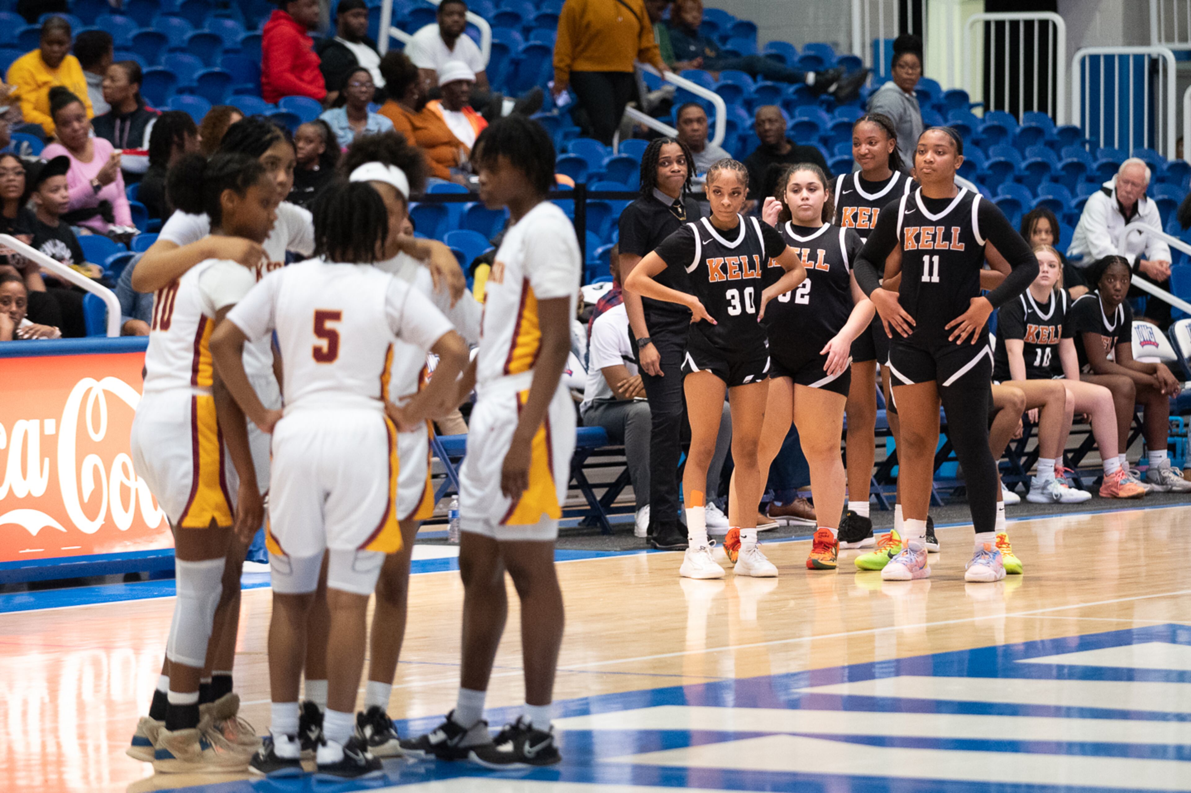 Players wait for the timeout to end during the Kell vs. Jackson game. Jamie Spaar for the Atlanta Journal-Constitution