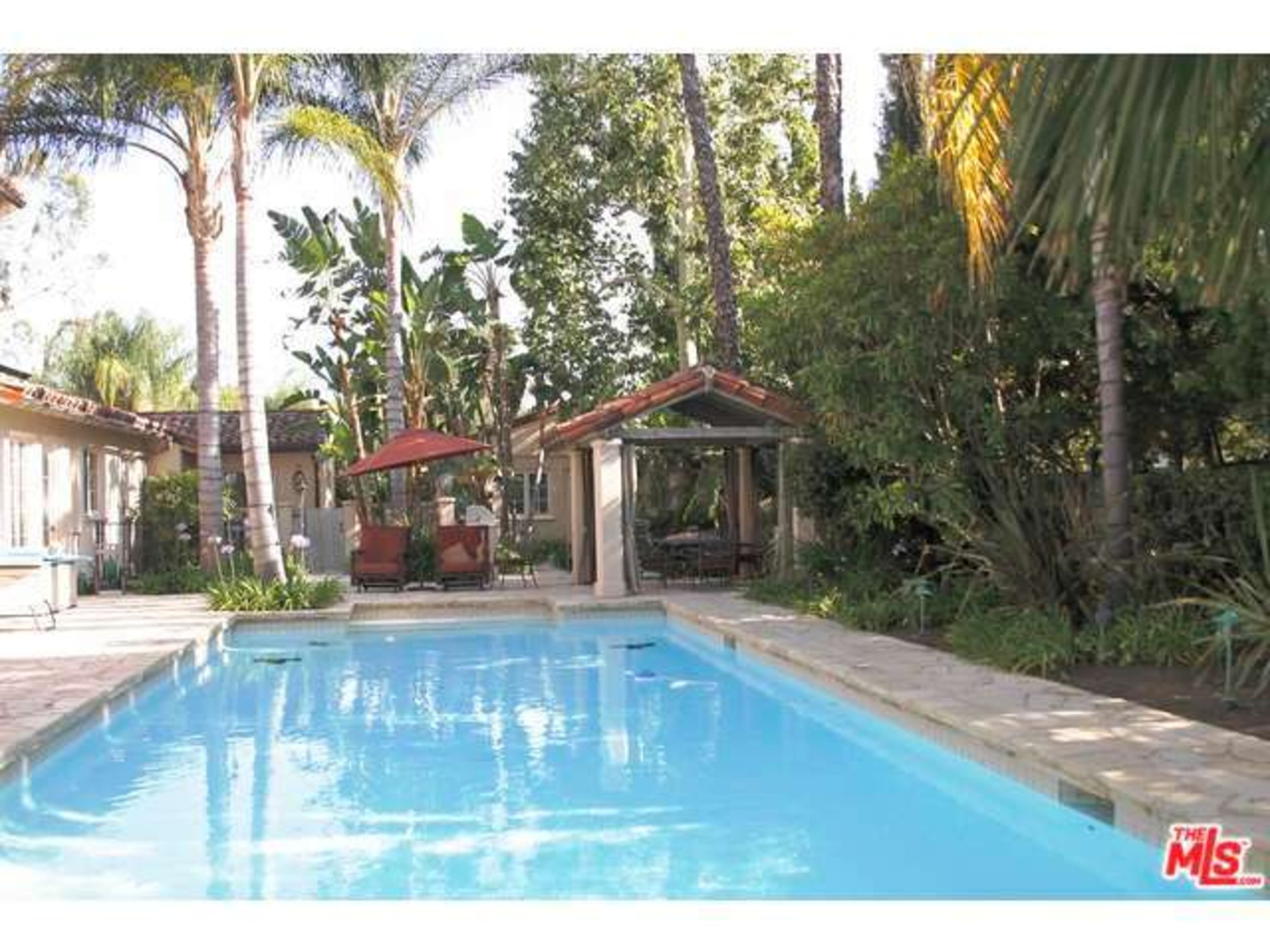 The outdoor area comes with a cabana, pool, and BBQ. Information: http://www.redfin.com/CA/Tarzana/5143-Otis-Ave-91356/home/4110687