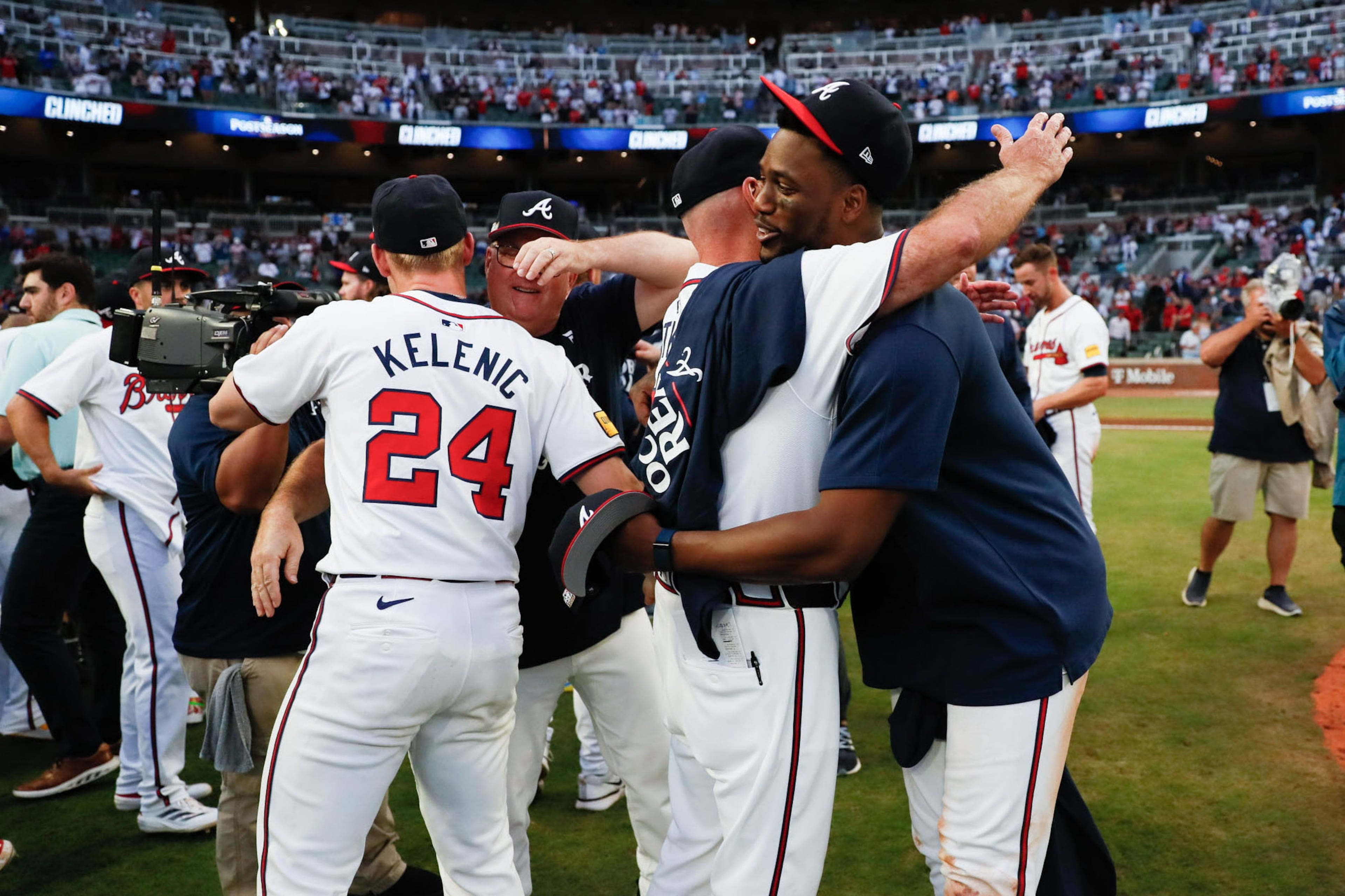 Braves manager Brian Snitker hugs outfielder Jorge Soler after their 3-0 win over the Mets.
(Miguel Martinez/ AJC)