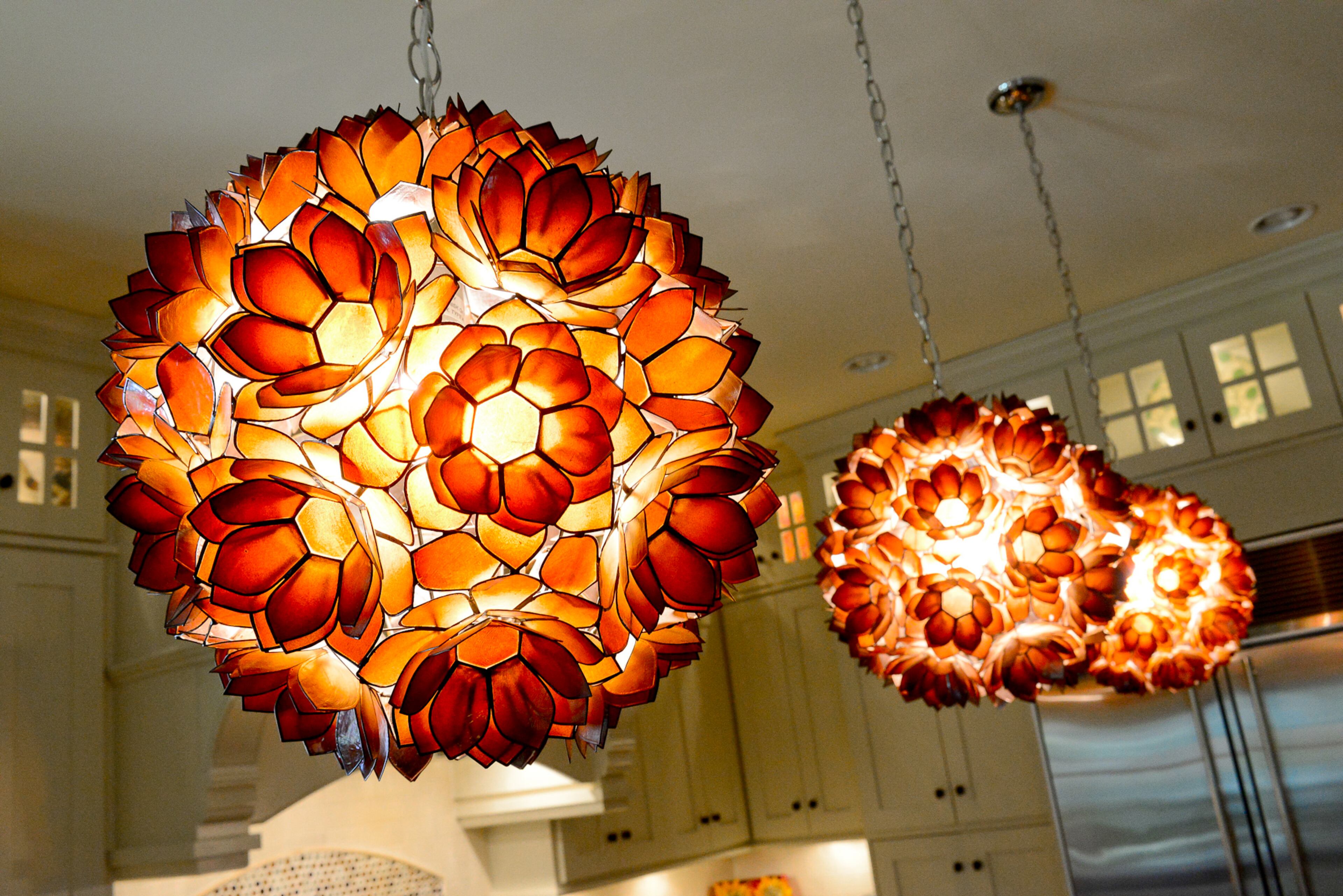 Over the new island, Floral-inspired pendants from Lamps Plus complete the updated look of the kitchen. The homeowners worked with Heidi Straughan of Heidi's Home Staging & Redesign.