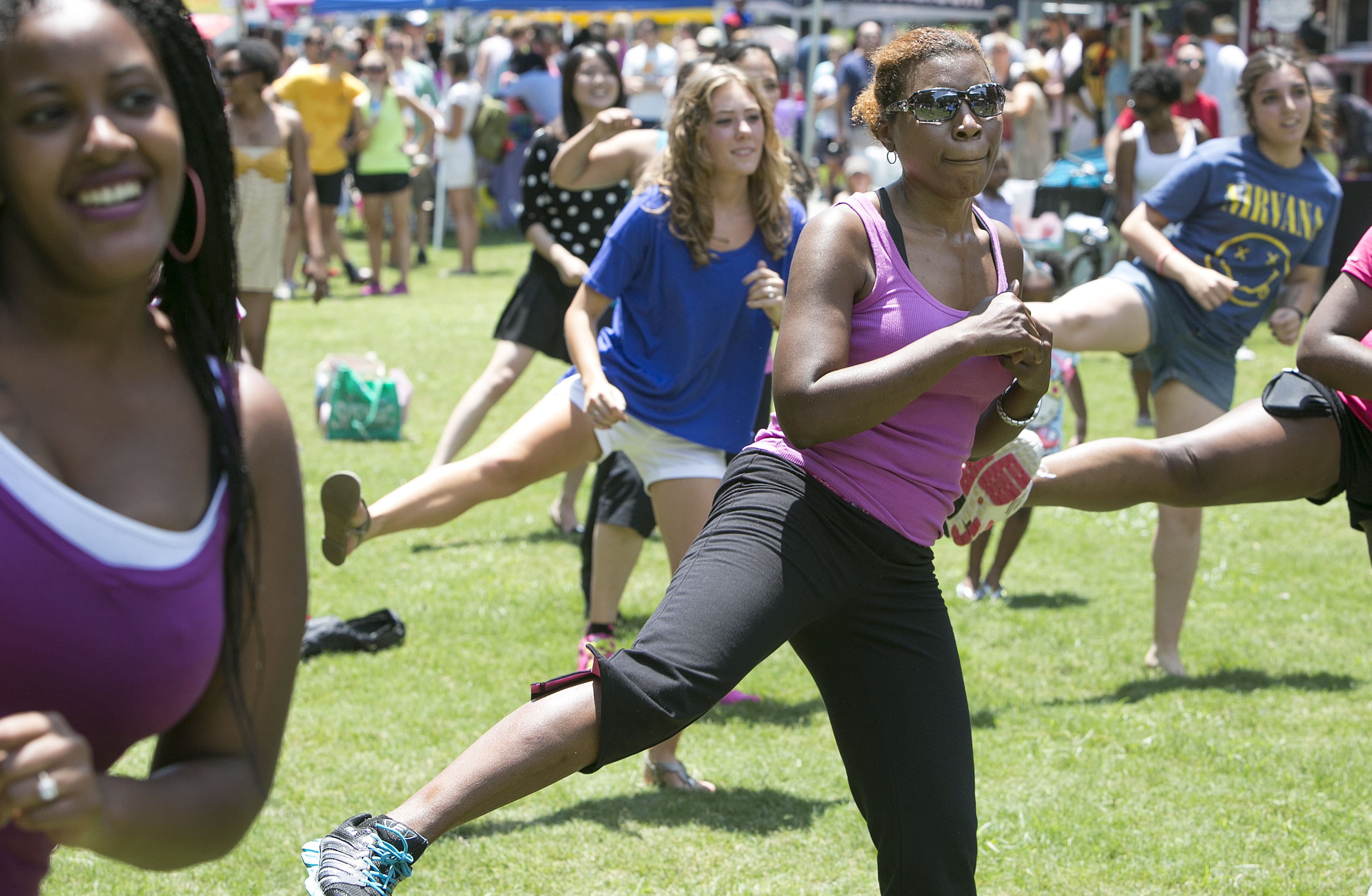 Lennie Miranda participated in a Boom Shock fitness group exercise event. Local artisans and national classics presented their best products at the 4th Annual Atlanta Ice Cream Festival at Piedmont Park in Atlanta on Saturday, July 26, 2014. There was a variety of health /wellness agencies, fitness routines, vendors, entertainment, bands and fun family activities. (Photo by Phil Skinner)