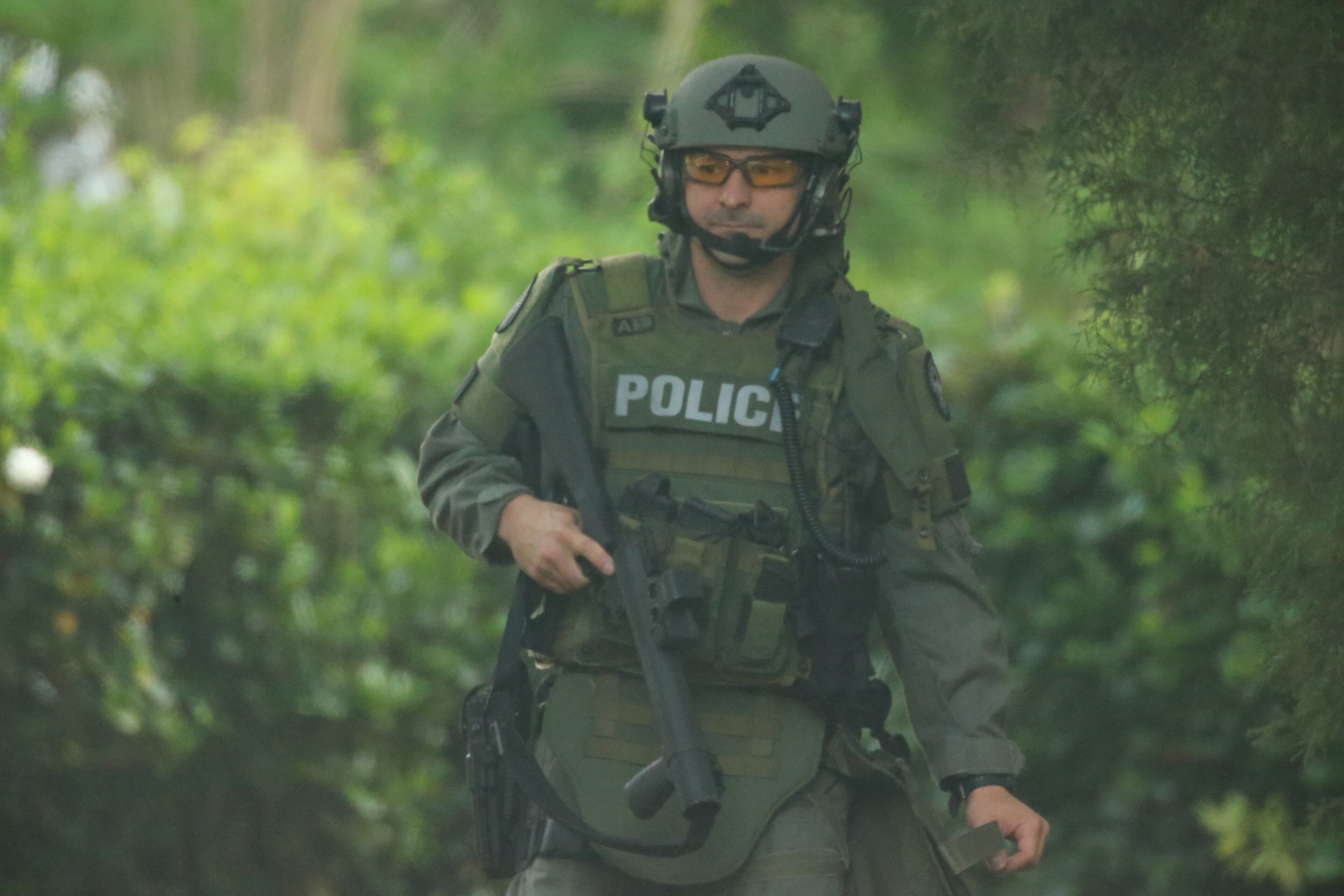 The incident began around 1:30 a.m. with reports of a man pulling a gun on a woman at a home in the 2400 block of Baxter Street. JOHN SPINK/JOHNSPINK@AJC.COM